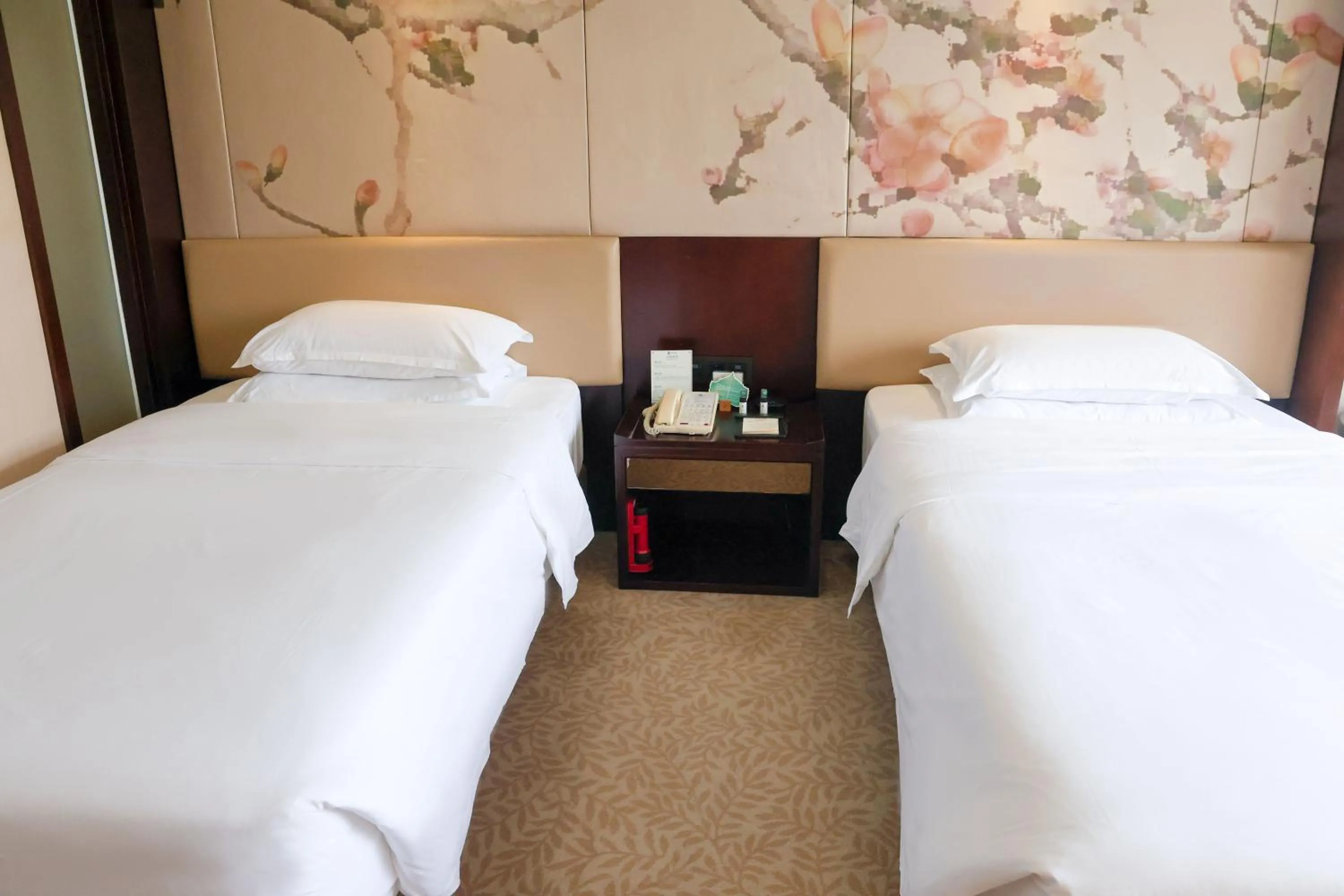 Bed in Guangdong Yingbin Hotel