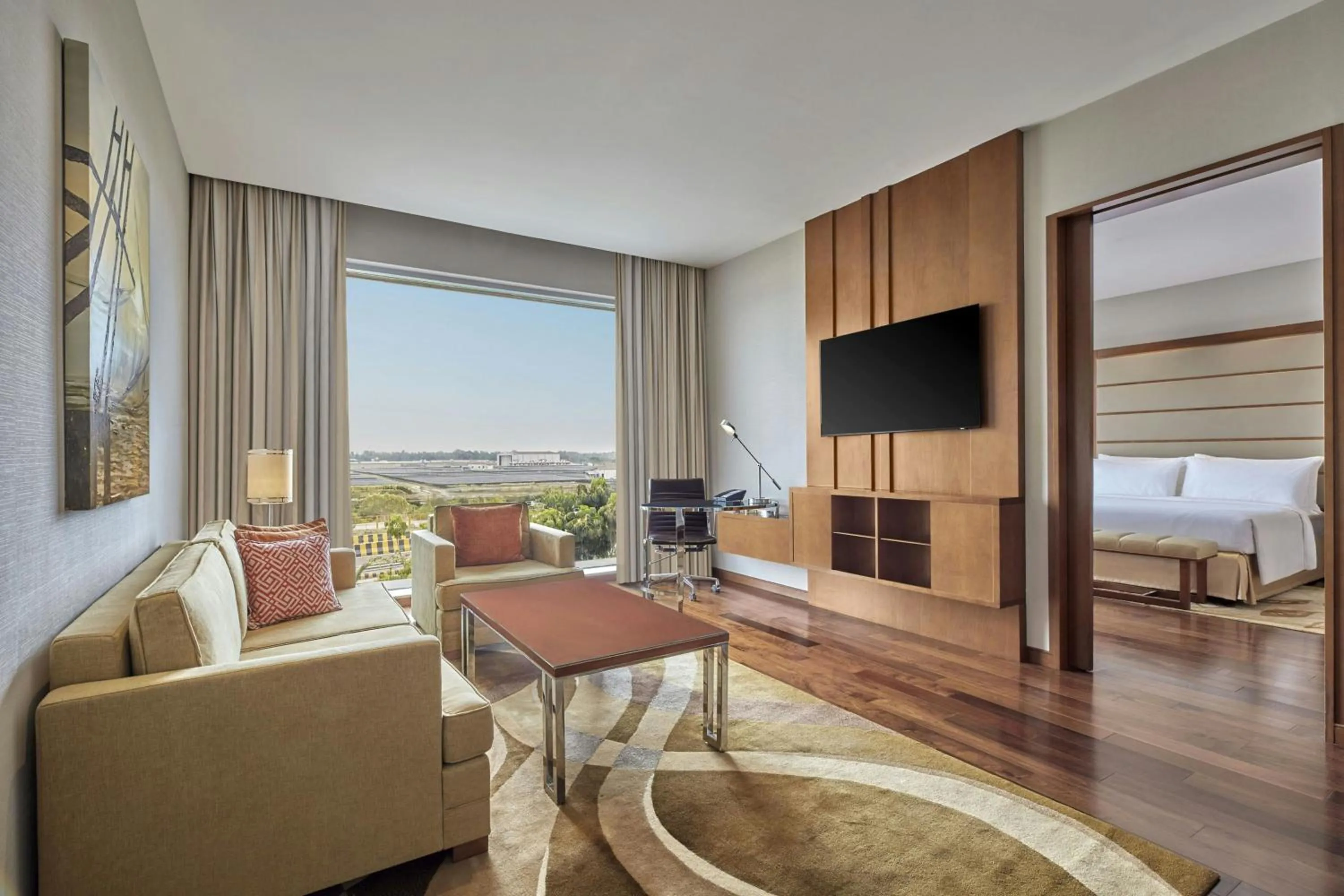 Living room, Bed in Courtyard by Marriott Kochi Airport