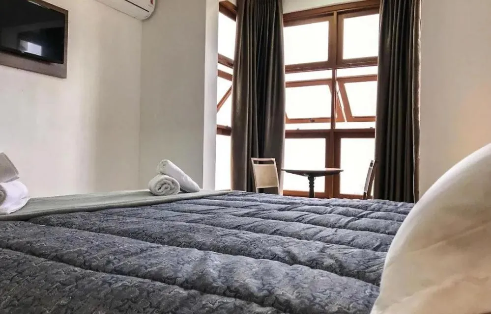 Bed in Hotel Triveneto Gramado