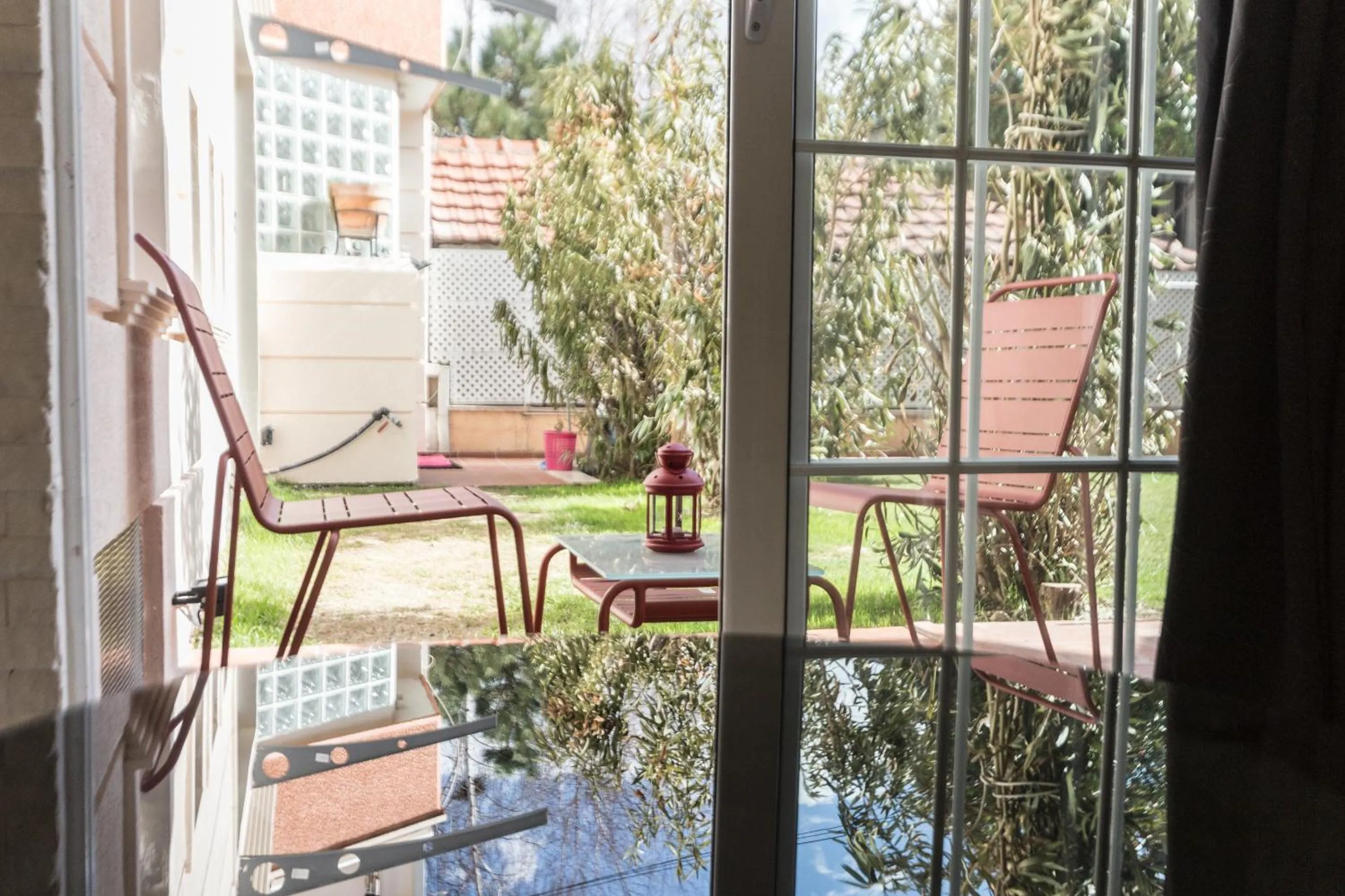 Garden view in Aloha Apartments with pool