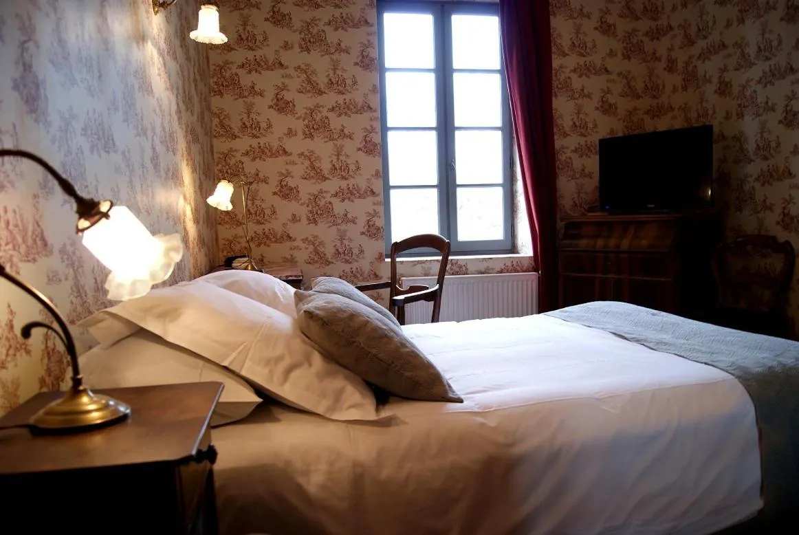 Bed in Logis Hotel - Restaurant La Marbrerie