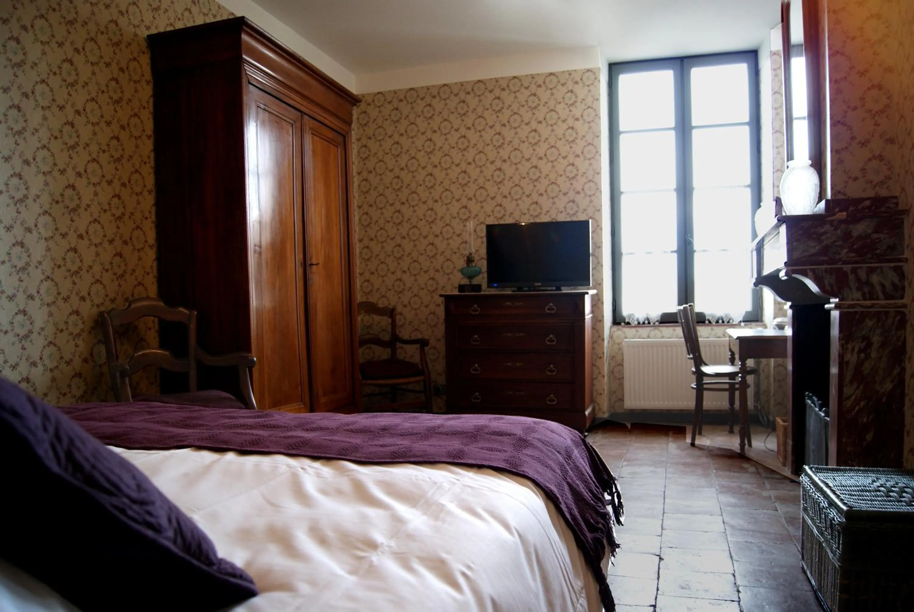 Bed in Logis Hotel - Restaurant La Marbrerie