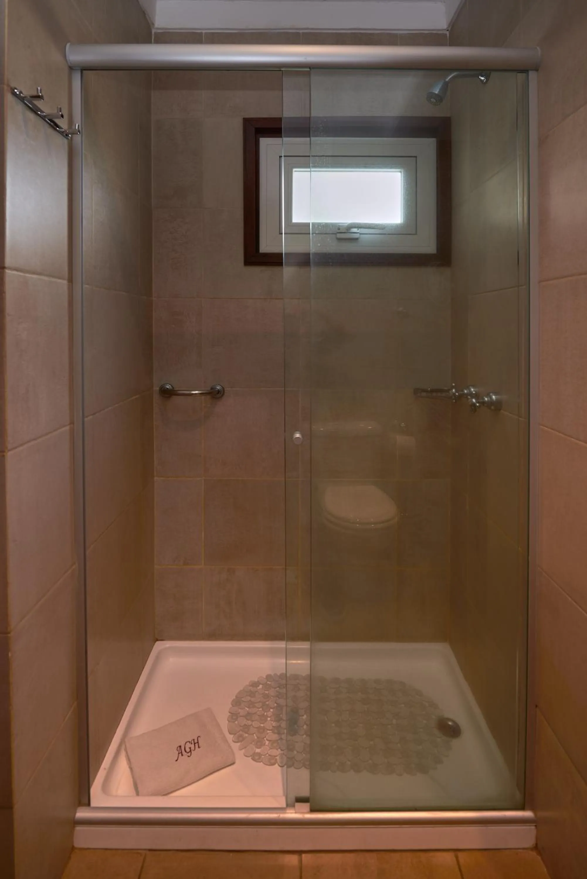 Shower in Altos de Guemes Hotel