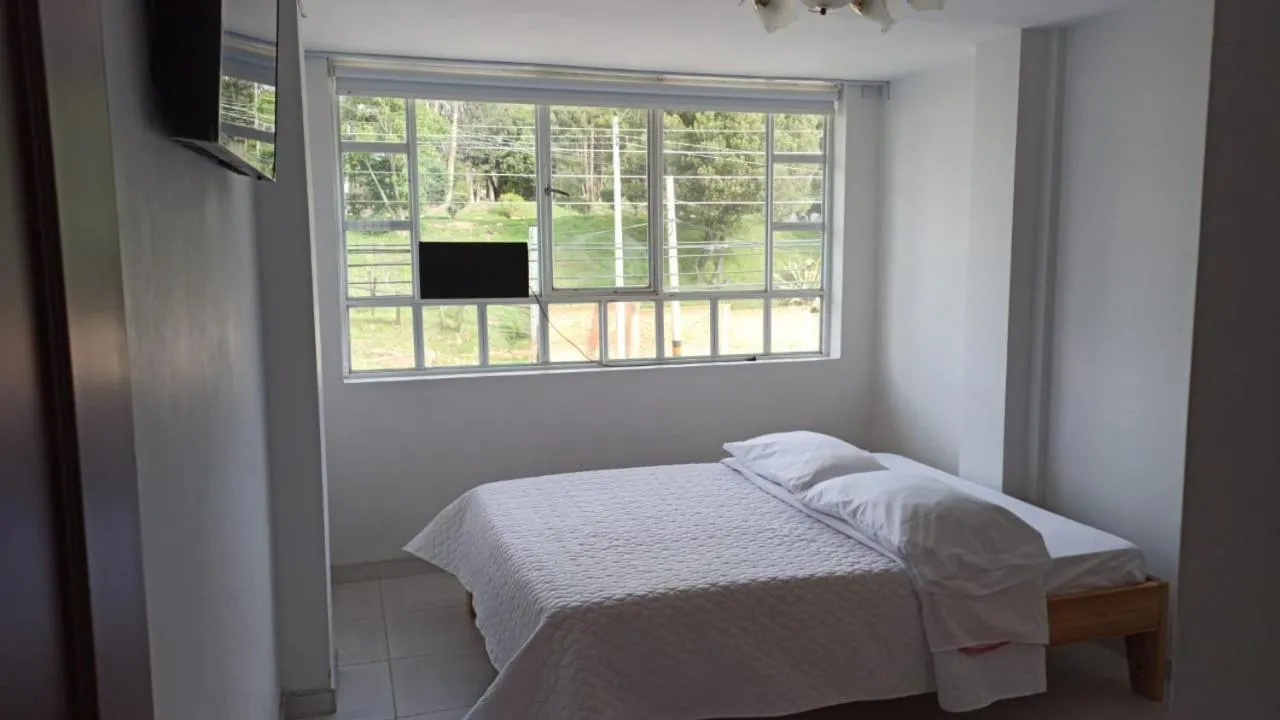 Bed in Hotel Mi Gloria