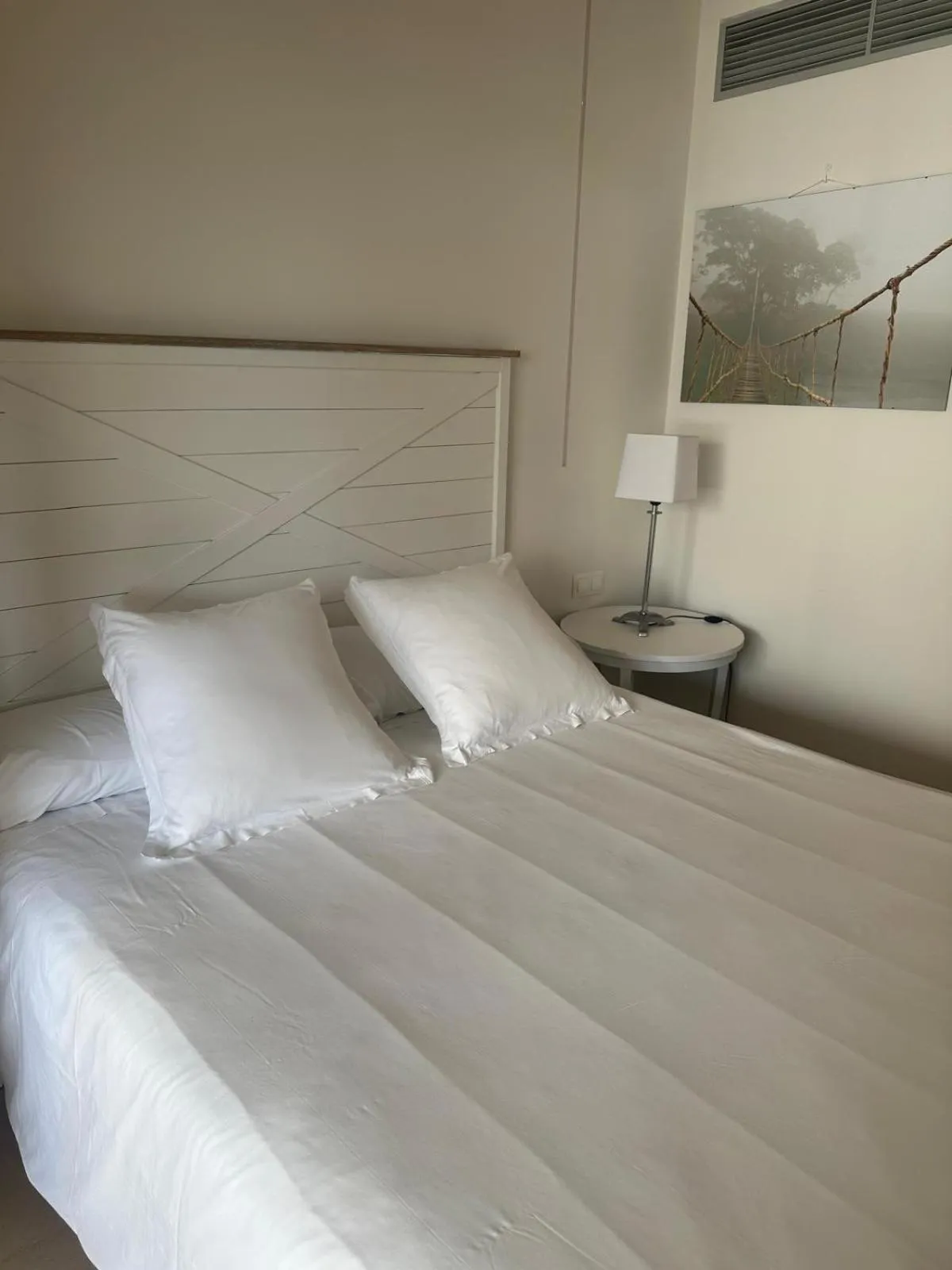 Bed in Apartamentos Guadalpin Boutique