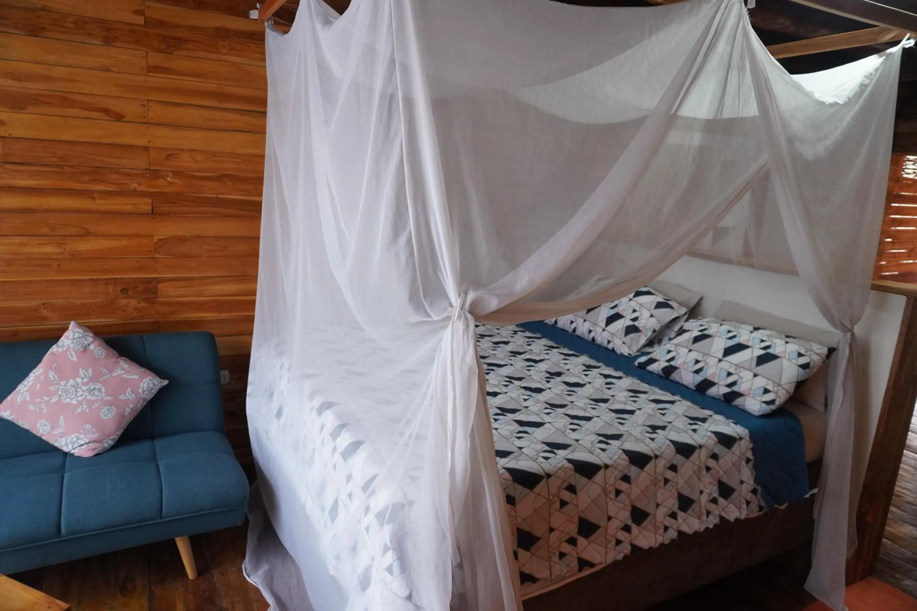 Bed in Hotel Calamari Baru