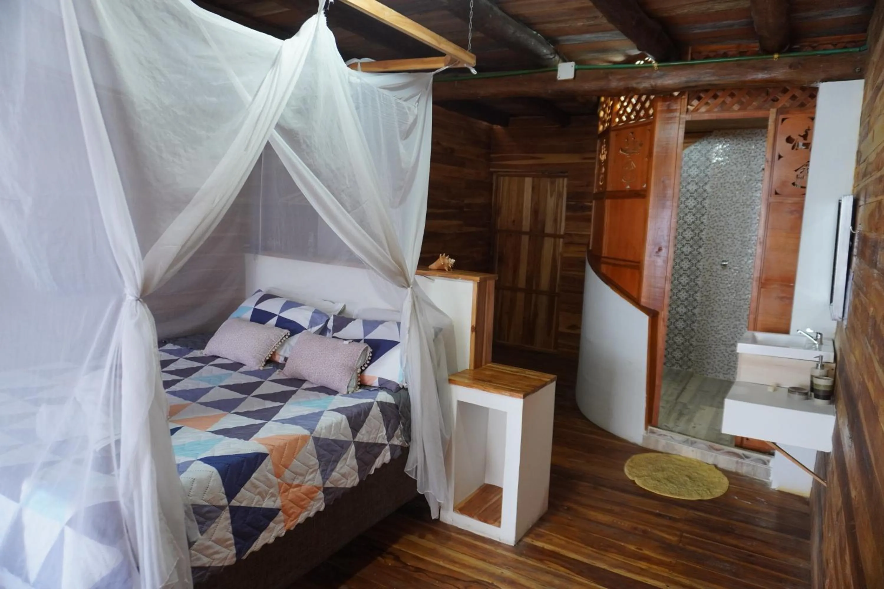 Bed in Hotel Calamari Baru