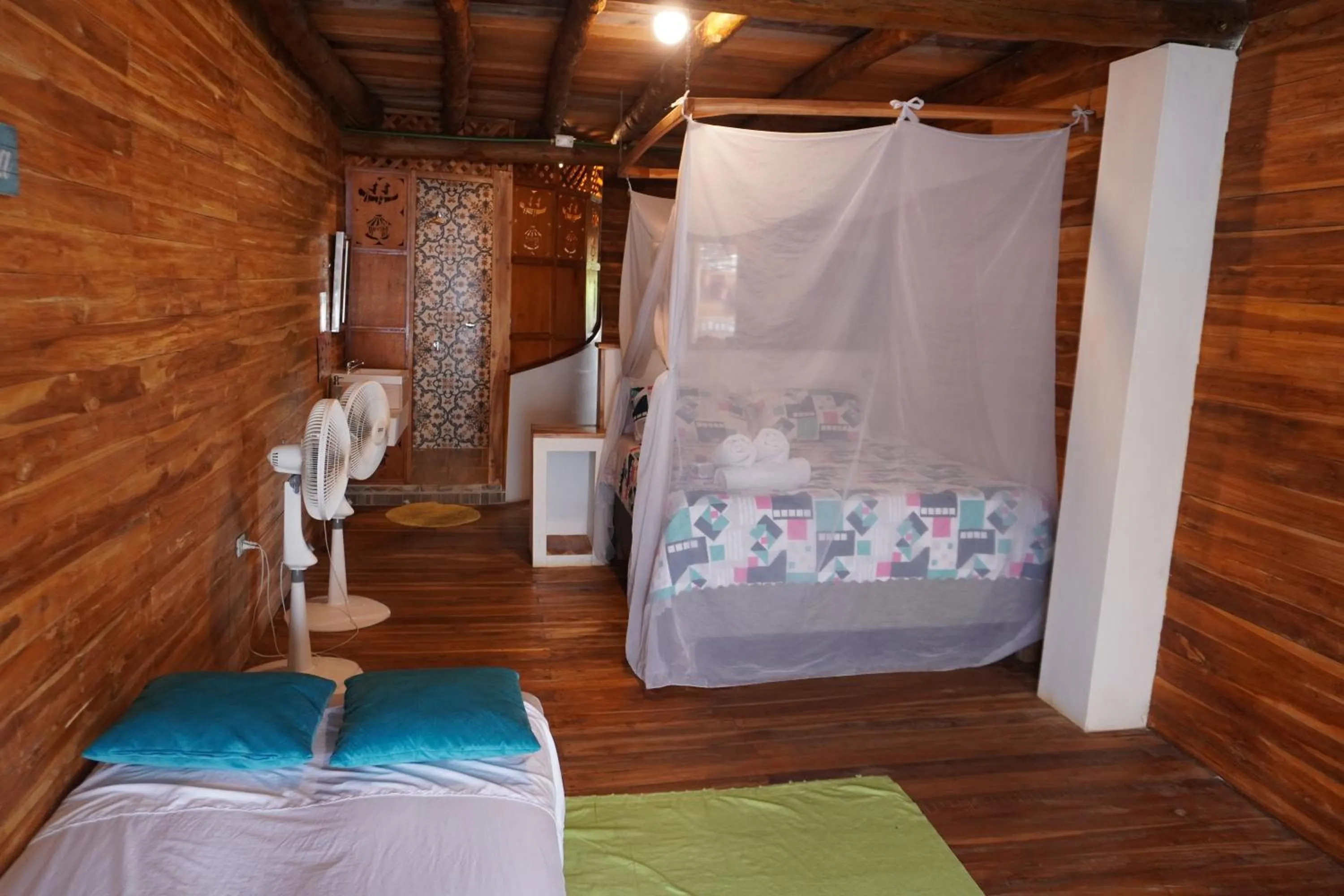 Bed in Hotel Calamari Baru