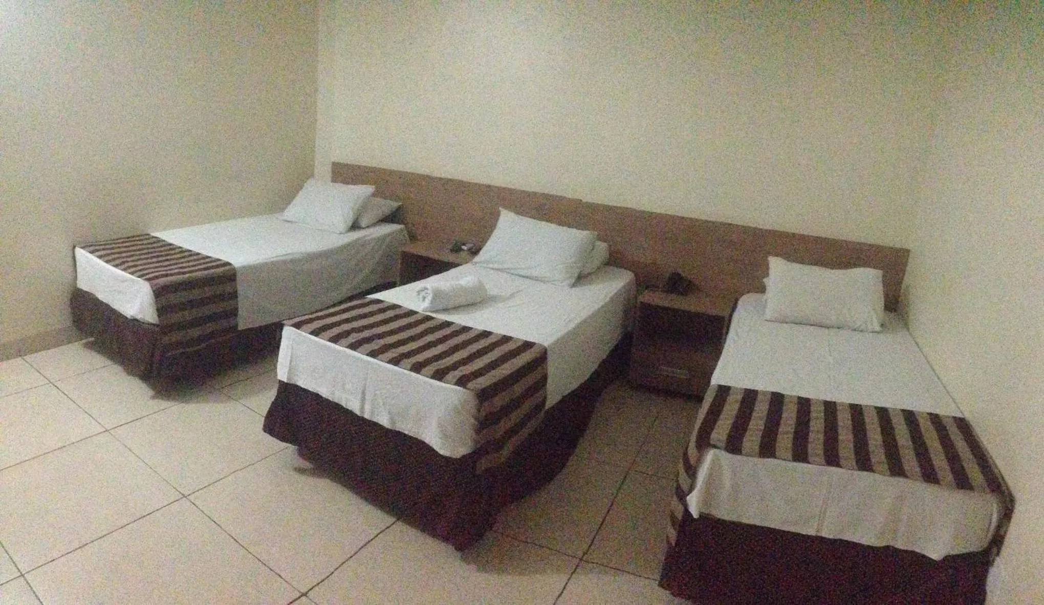 Standard Triple Room in Hotel Express - Leva e busca no aeroporto grátis 24 horas