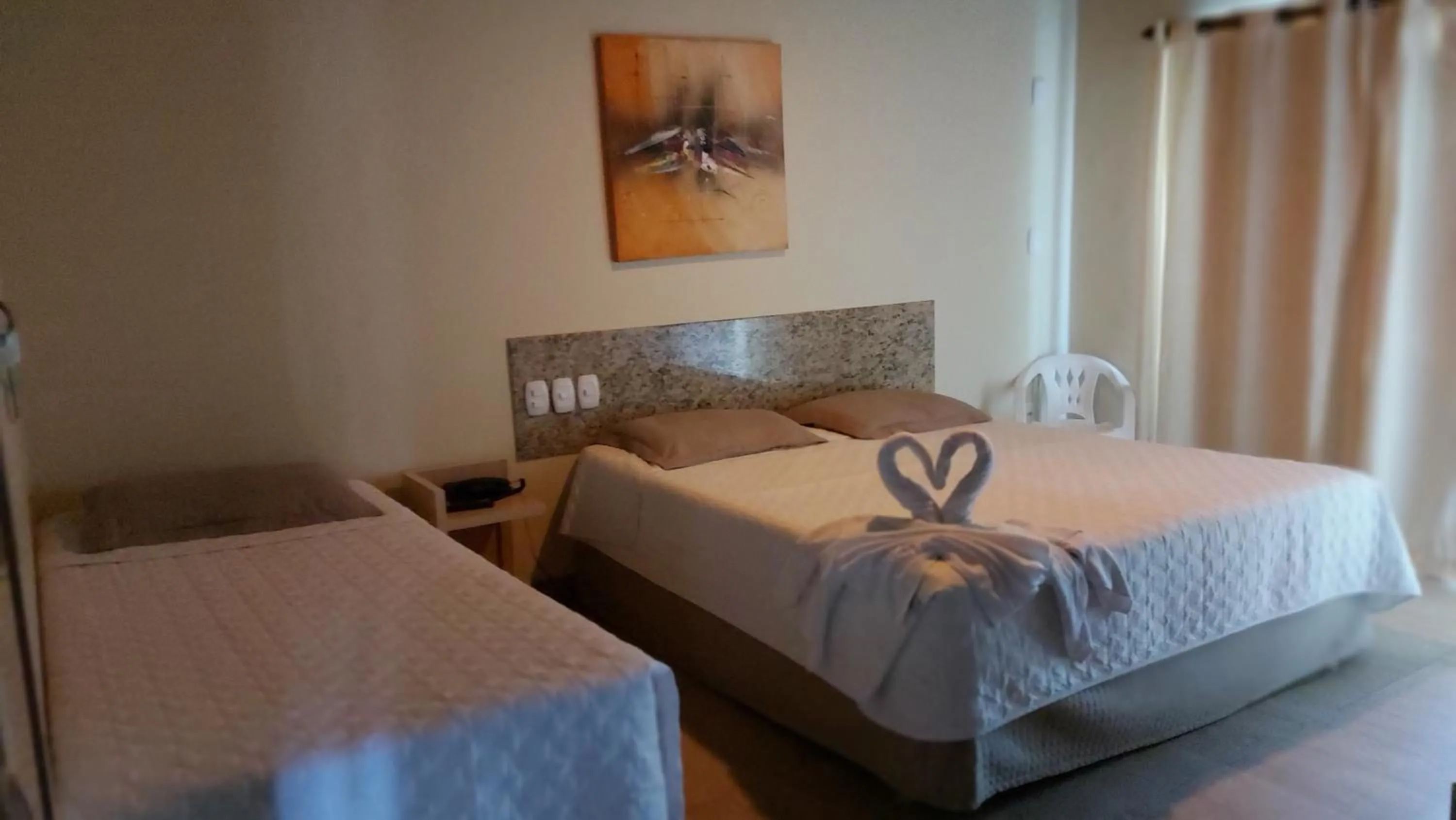 Bed in Porto Bali Hotel