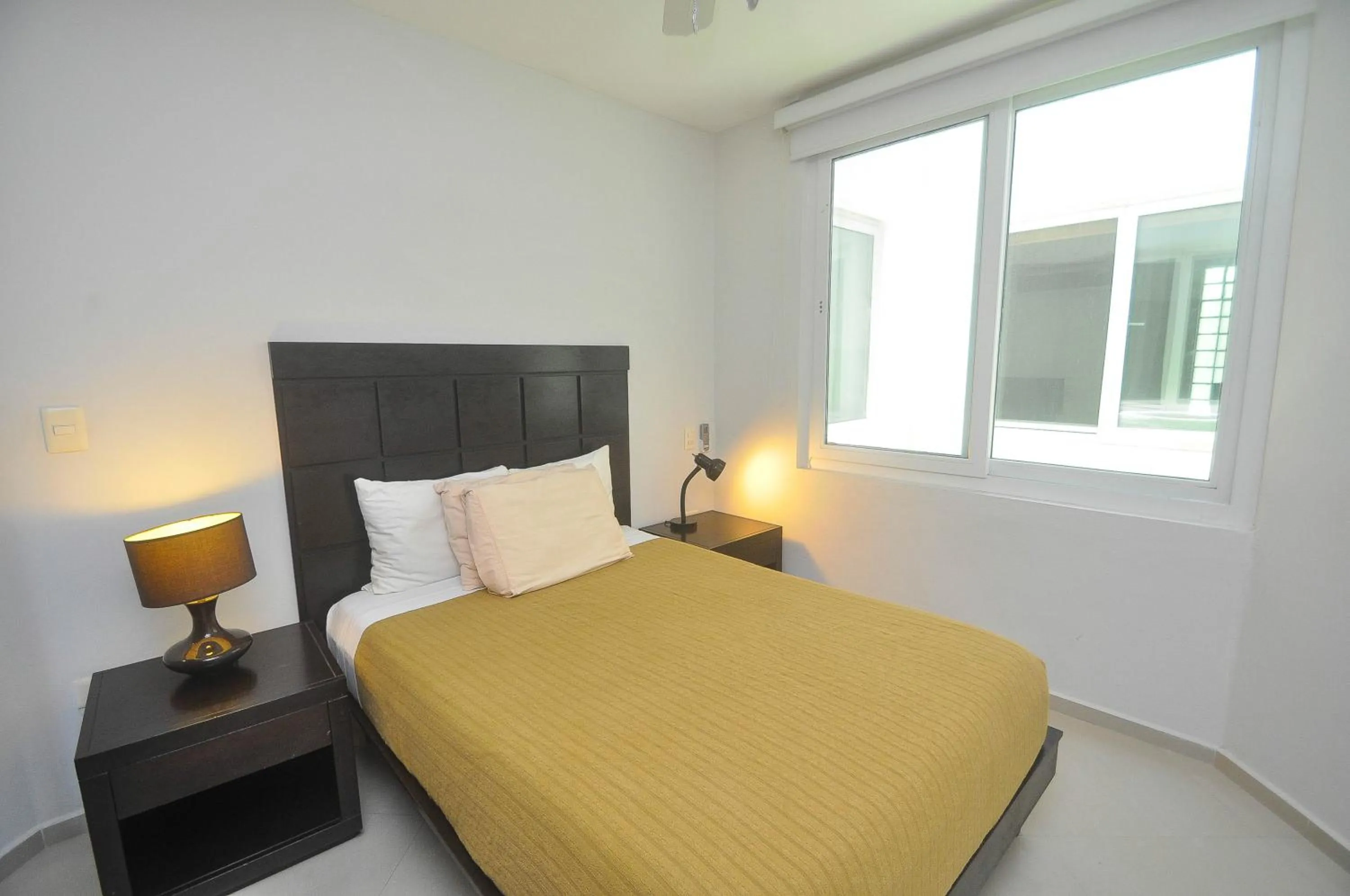 Bedroom, Bed in Phenomenal Location Near Beach & 5th with Stunning Roof Pool