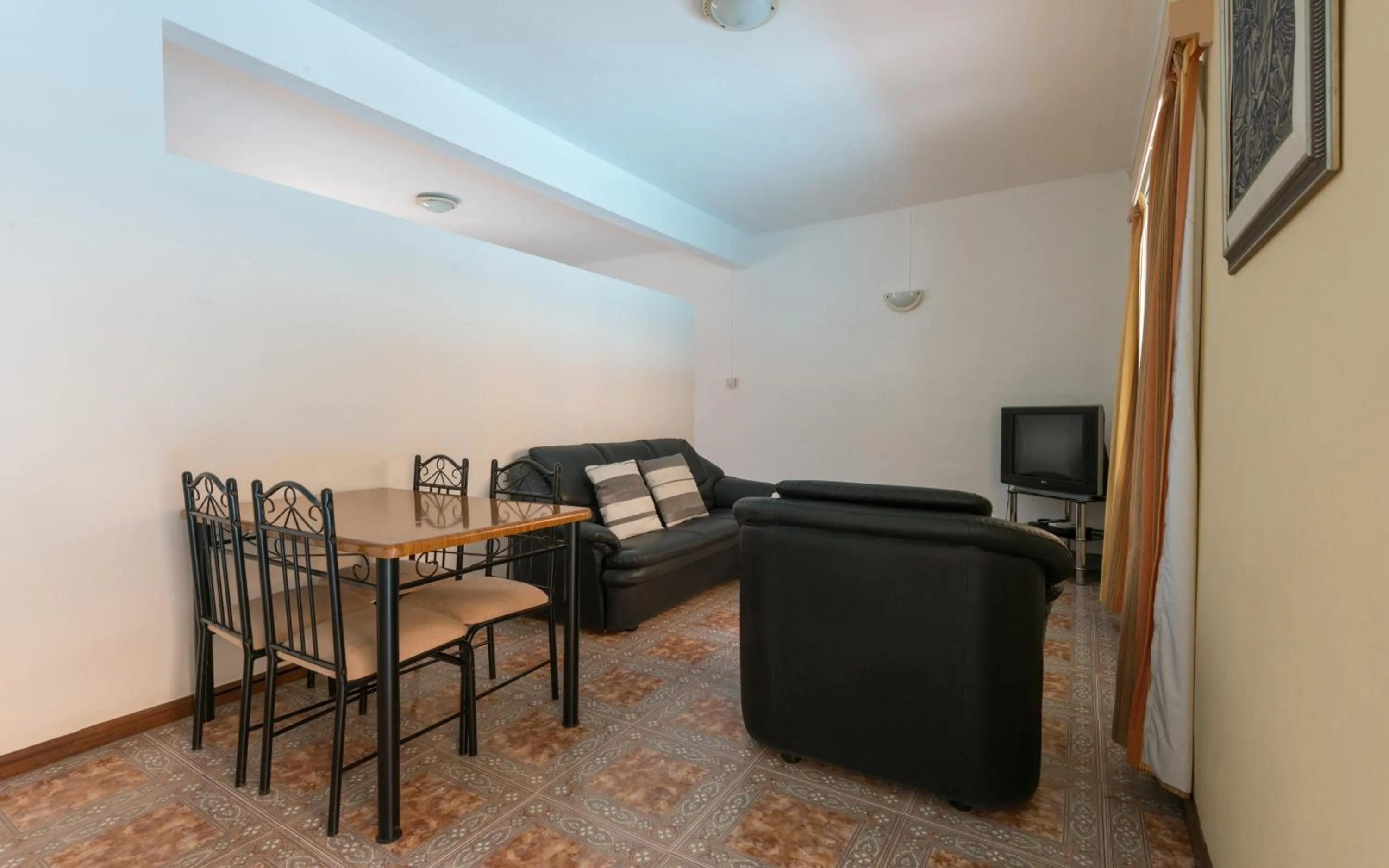 TV and multimedia in Wanna Studio Apartments