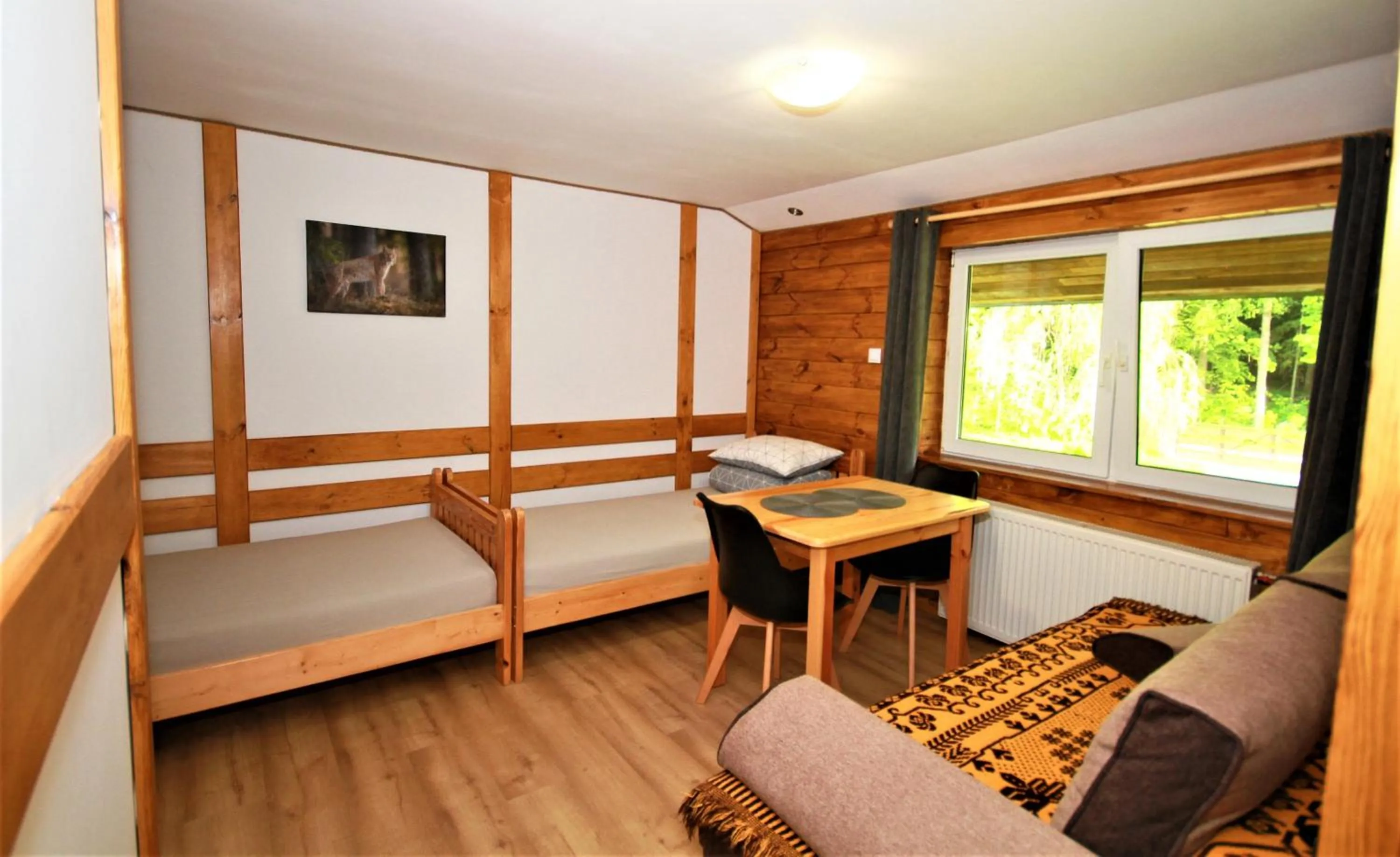 Bed in Białowieska Leśniczówka "U Jasia i Małgosi"