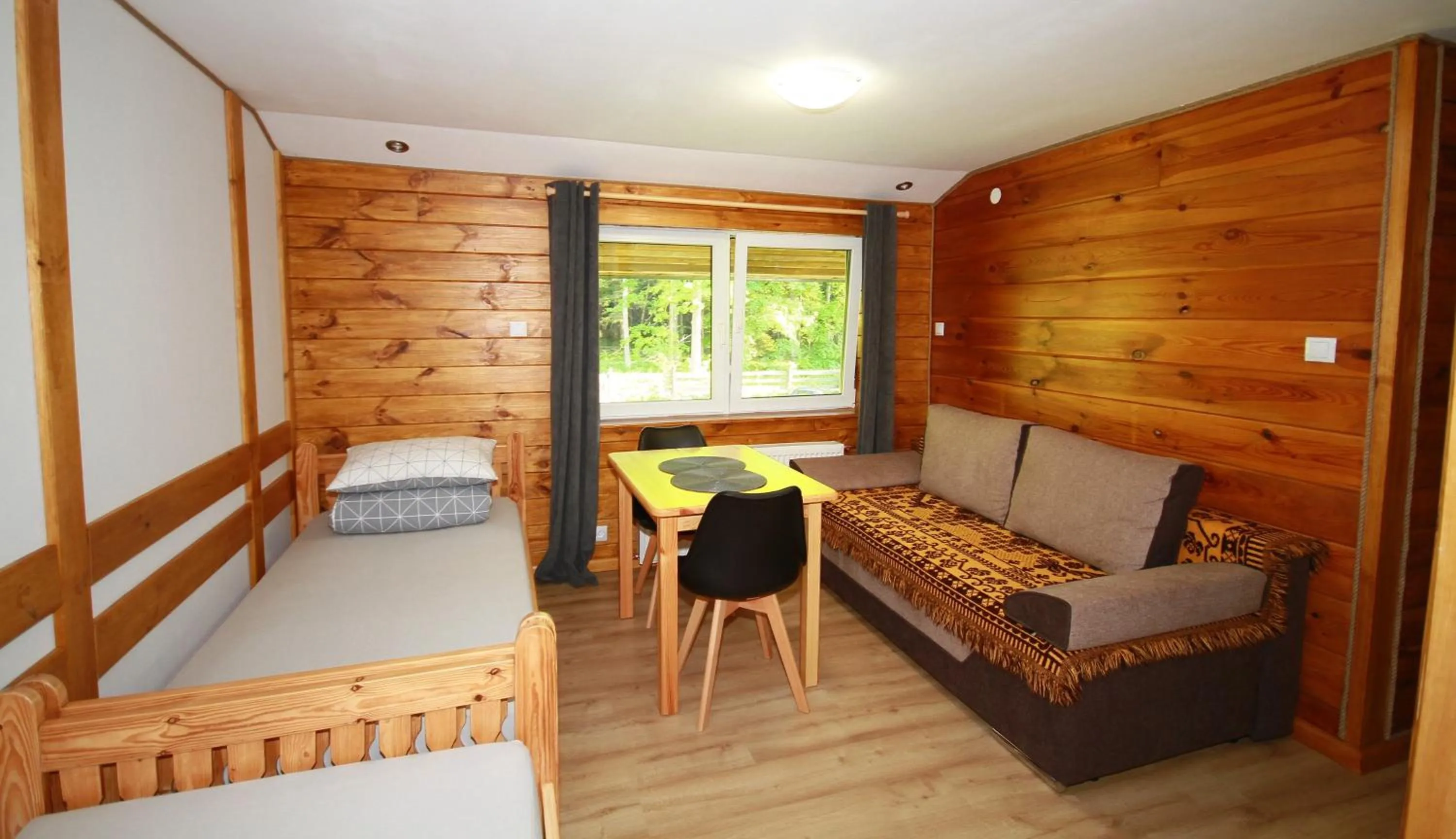 Bed in Białowieska Leśniczówka "U Jasia i Małgosi"