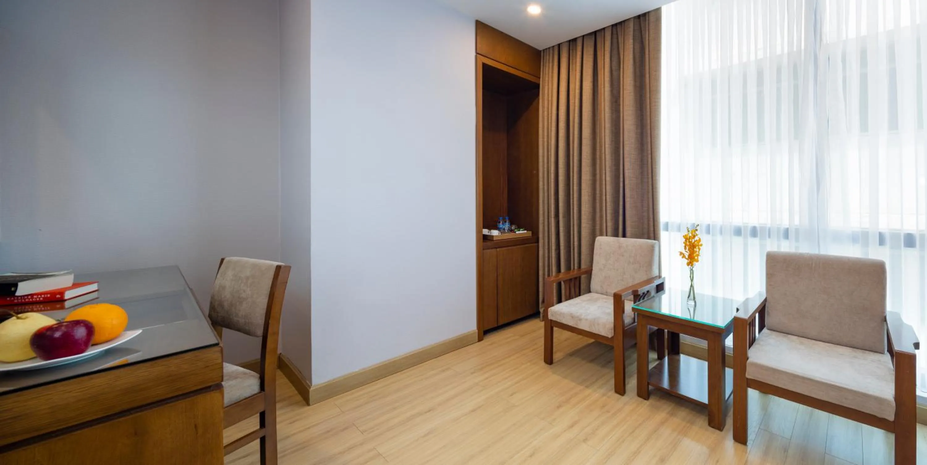 Living room in Eden Star Saigon Hotel