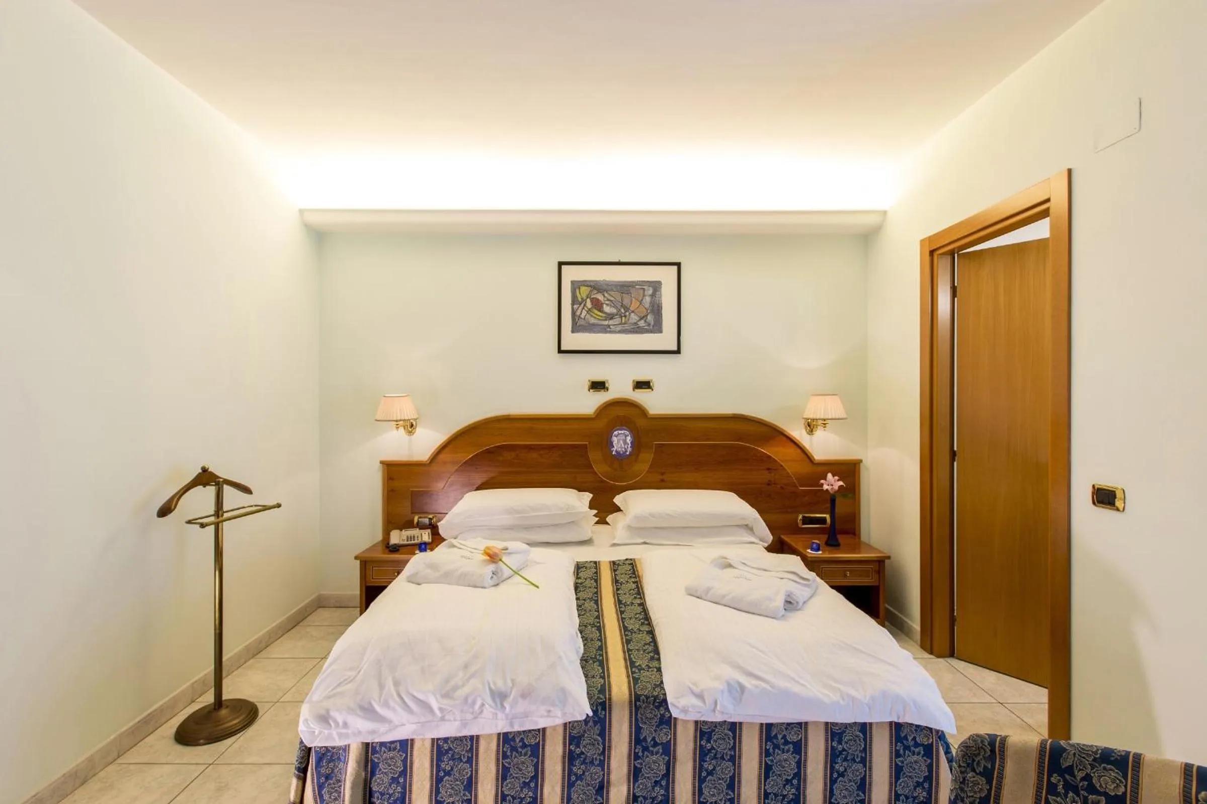 Bed in Hotel Ambassador