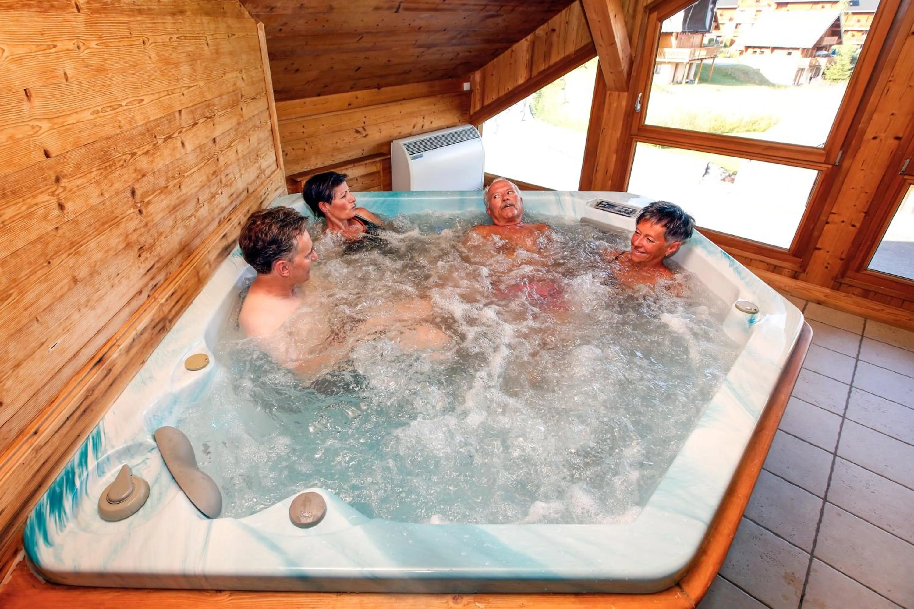 Hot Tub in Chalet-Hôtel Le Beausoleil, The Originals Relais