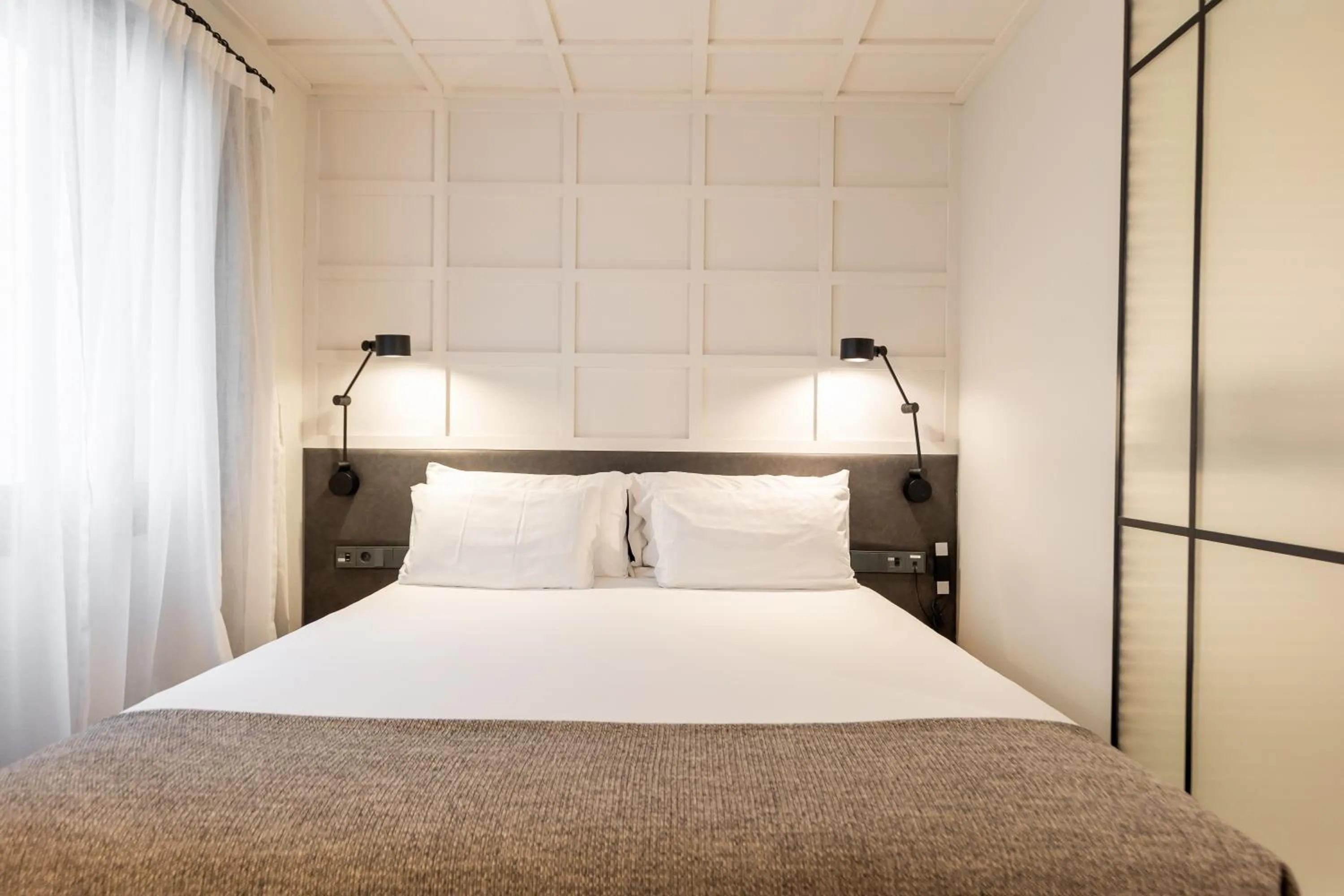 Bed in Yurbban Ramblas Boutique Hotel