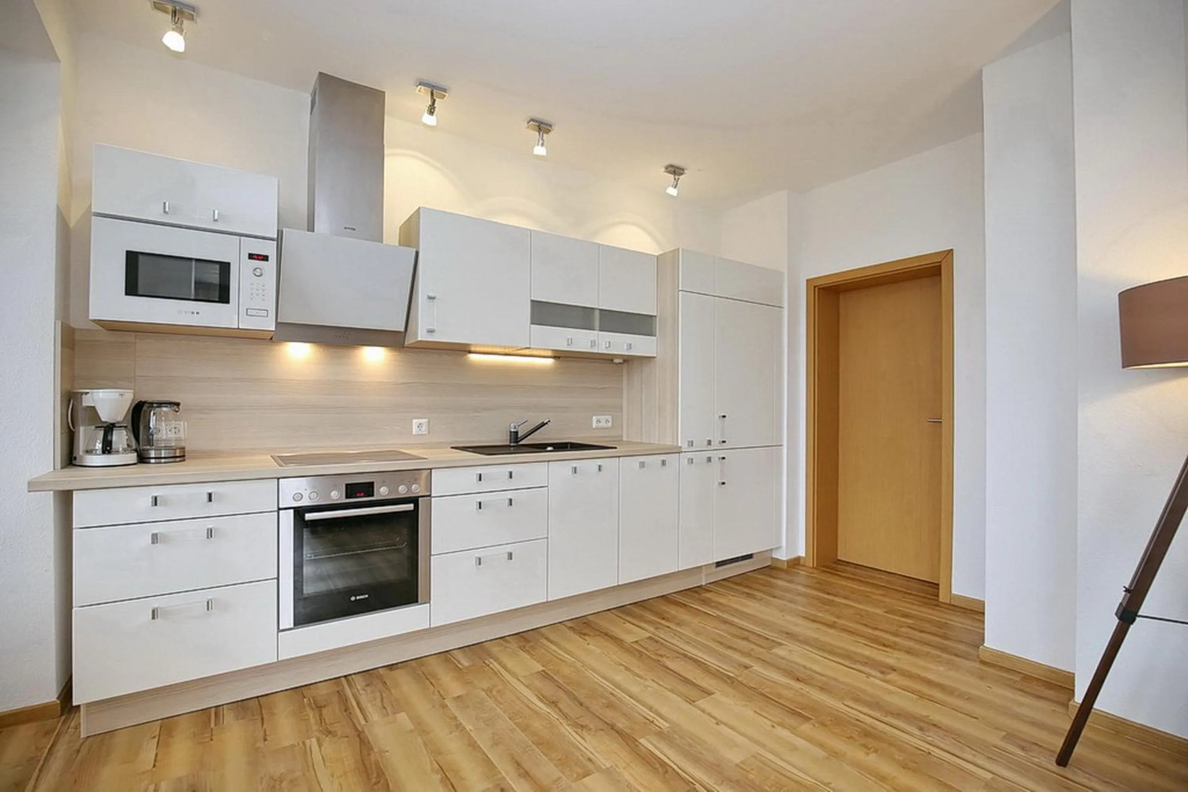 Kitchen or kitchenette in Villa Triton Wohnung 03