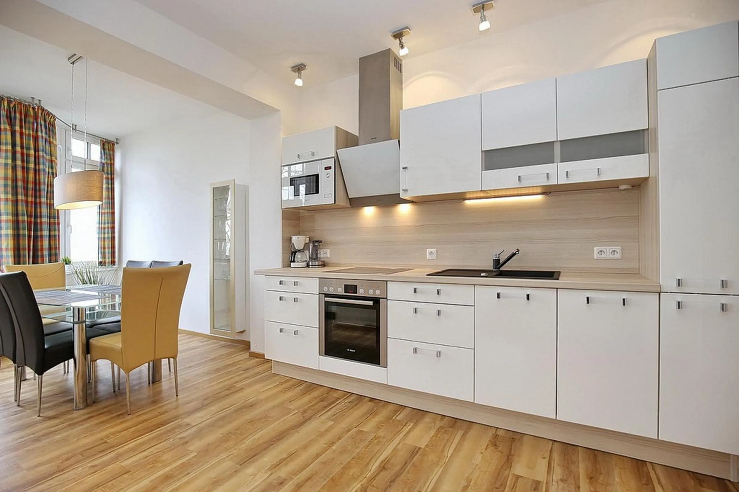 Kitchen or kitchenette in Villa Triton Wohnung 03