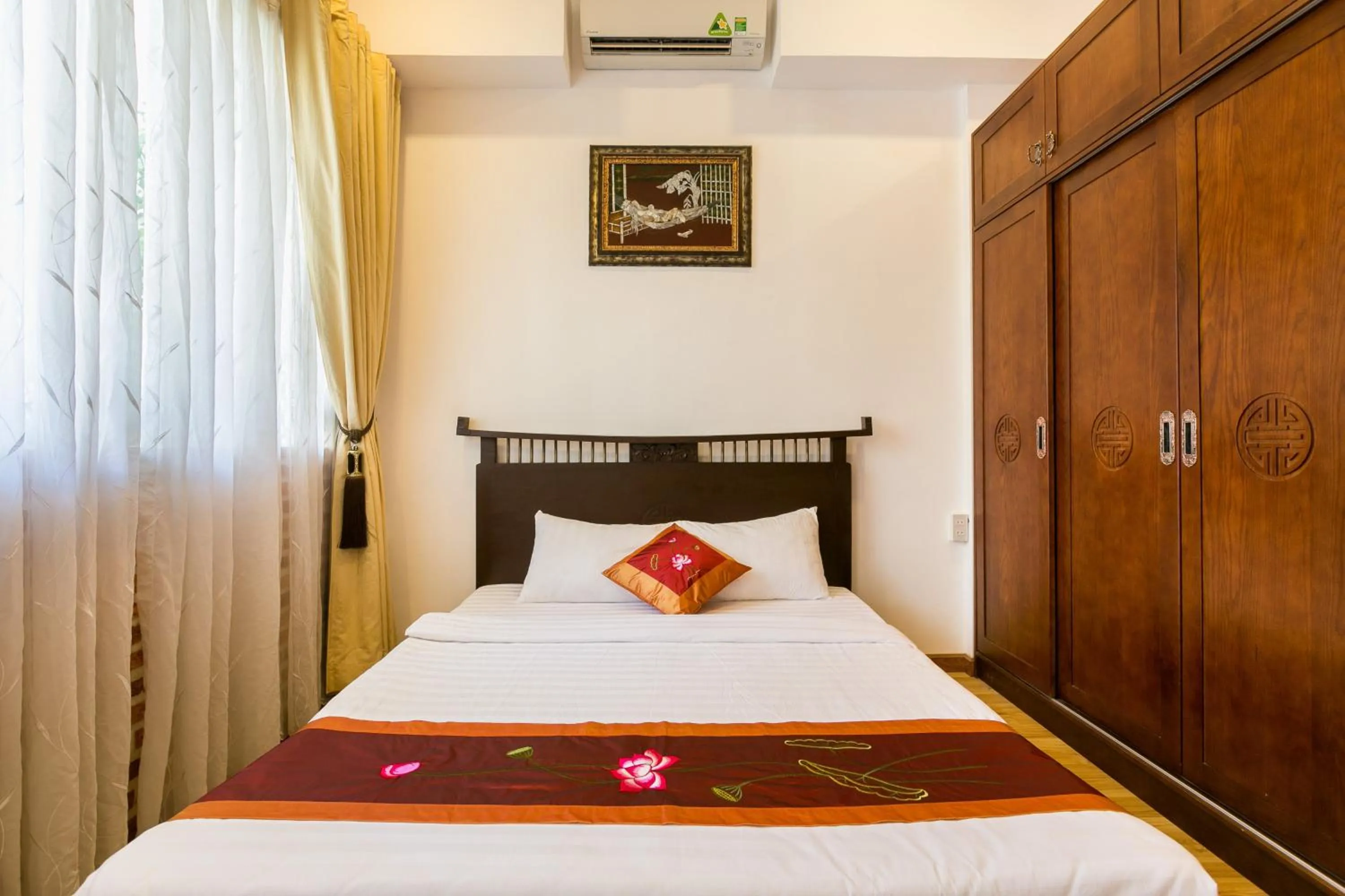 Bed in Indochine Ben Thanh Hotel & Apartments