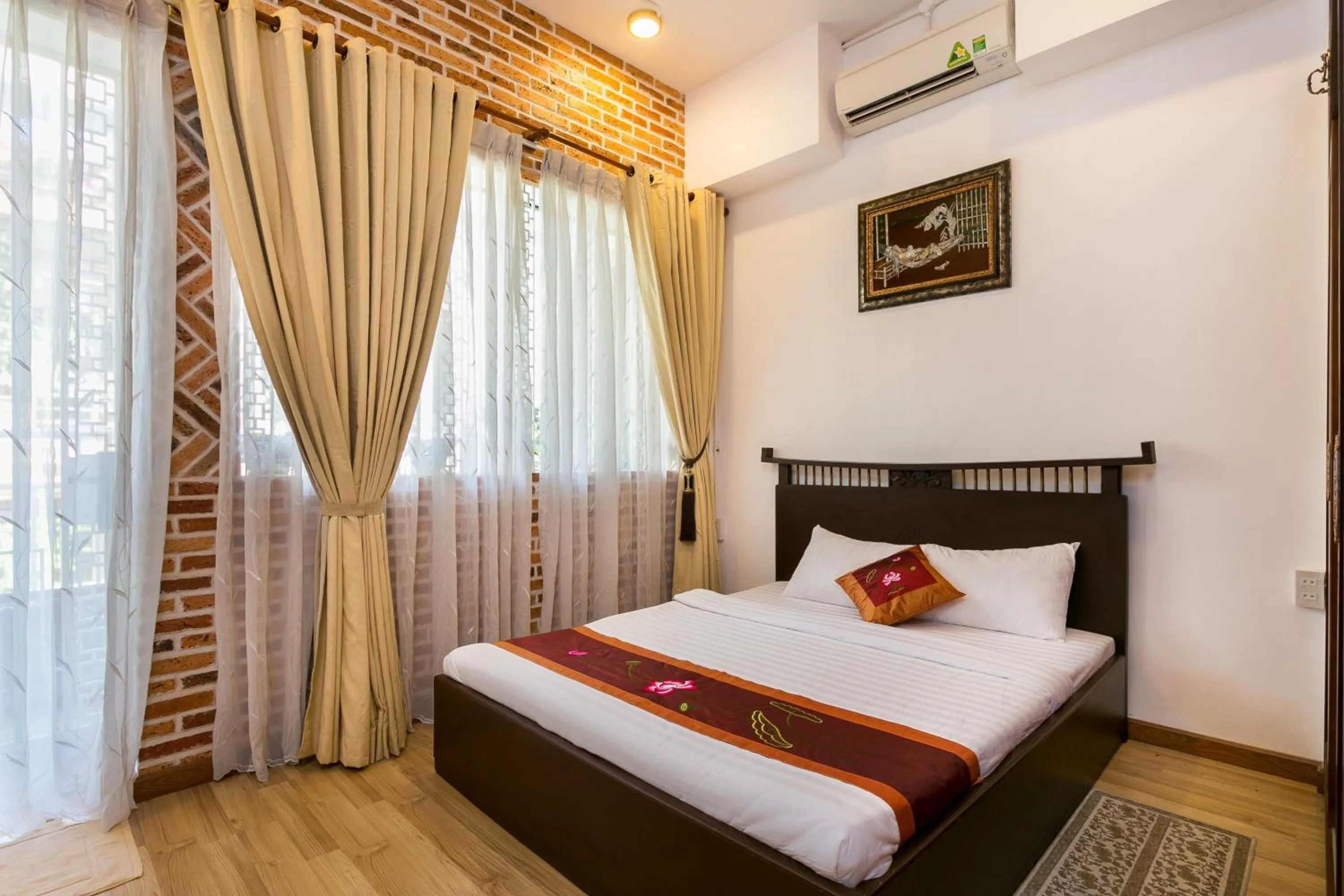 Photo of the whole room, Bed in Indochine Ben Thanh Hotel & Apartments