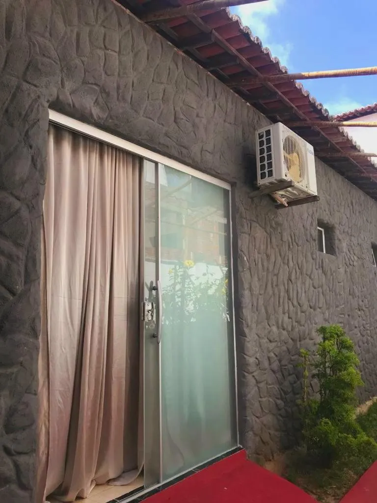 Property building in Relais de Charme Boutique Hotel Pititinga