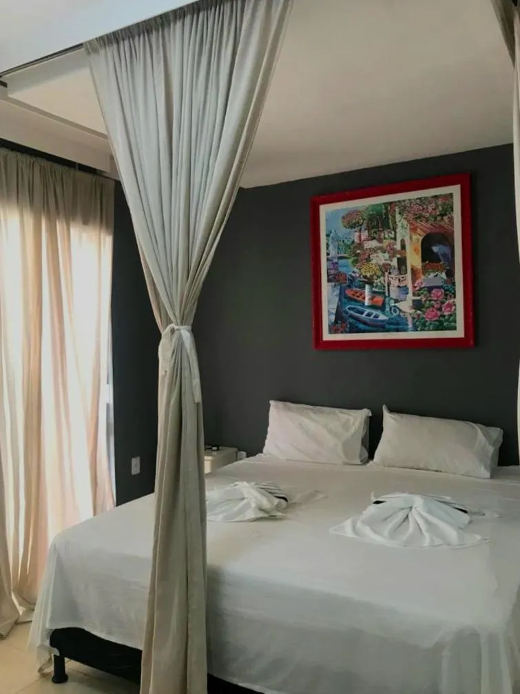 Bed in Relais de Charme Boutique Hotel Pititinga