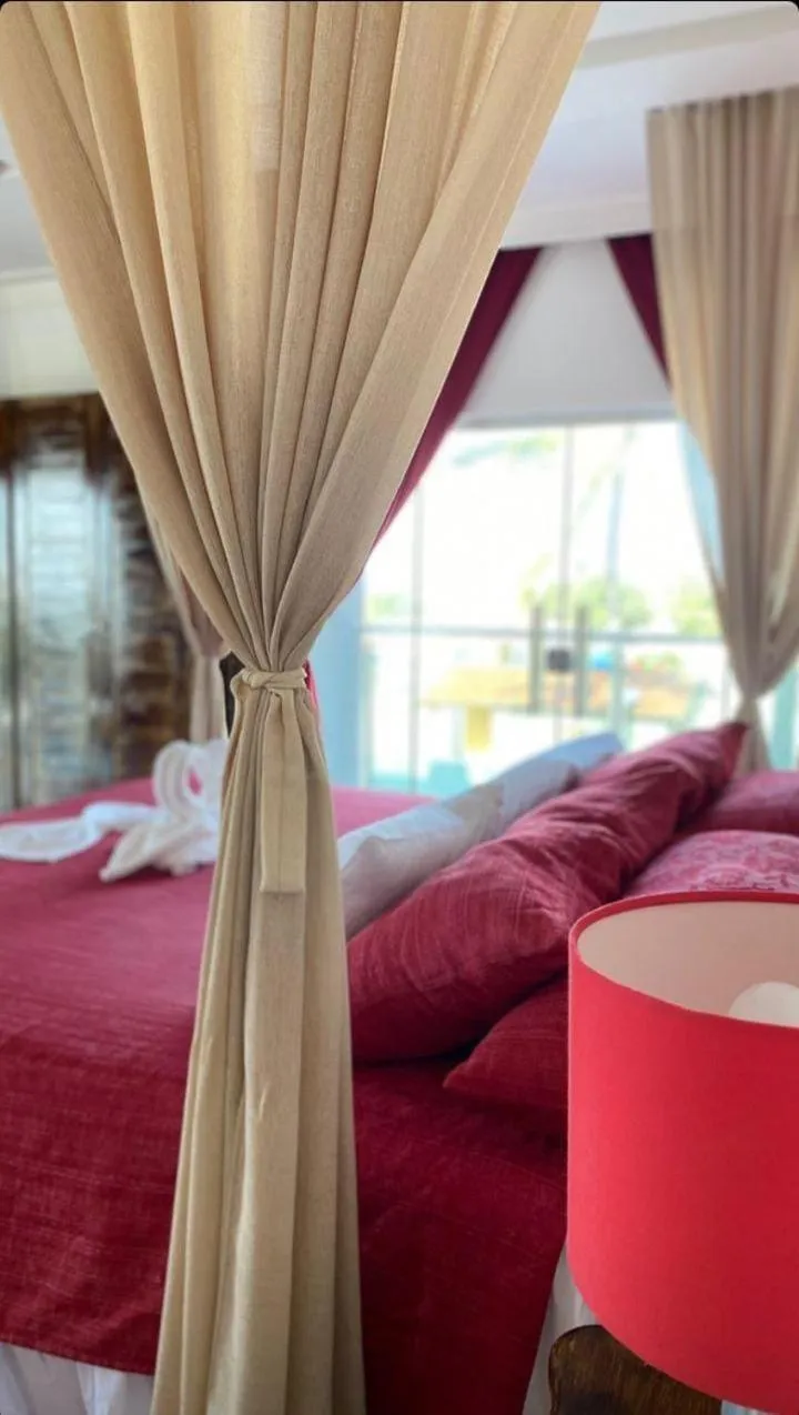 Photo of the whole room, Bed in Relais de Charme Boutique Hotel Pititinga