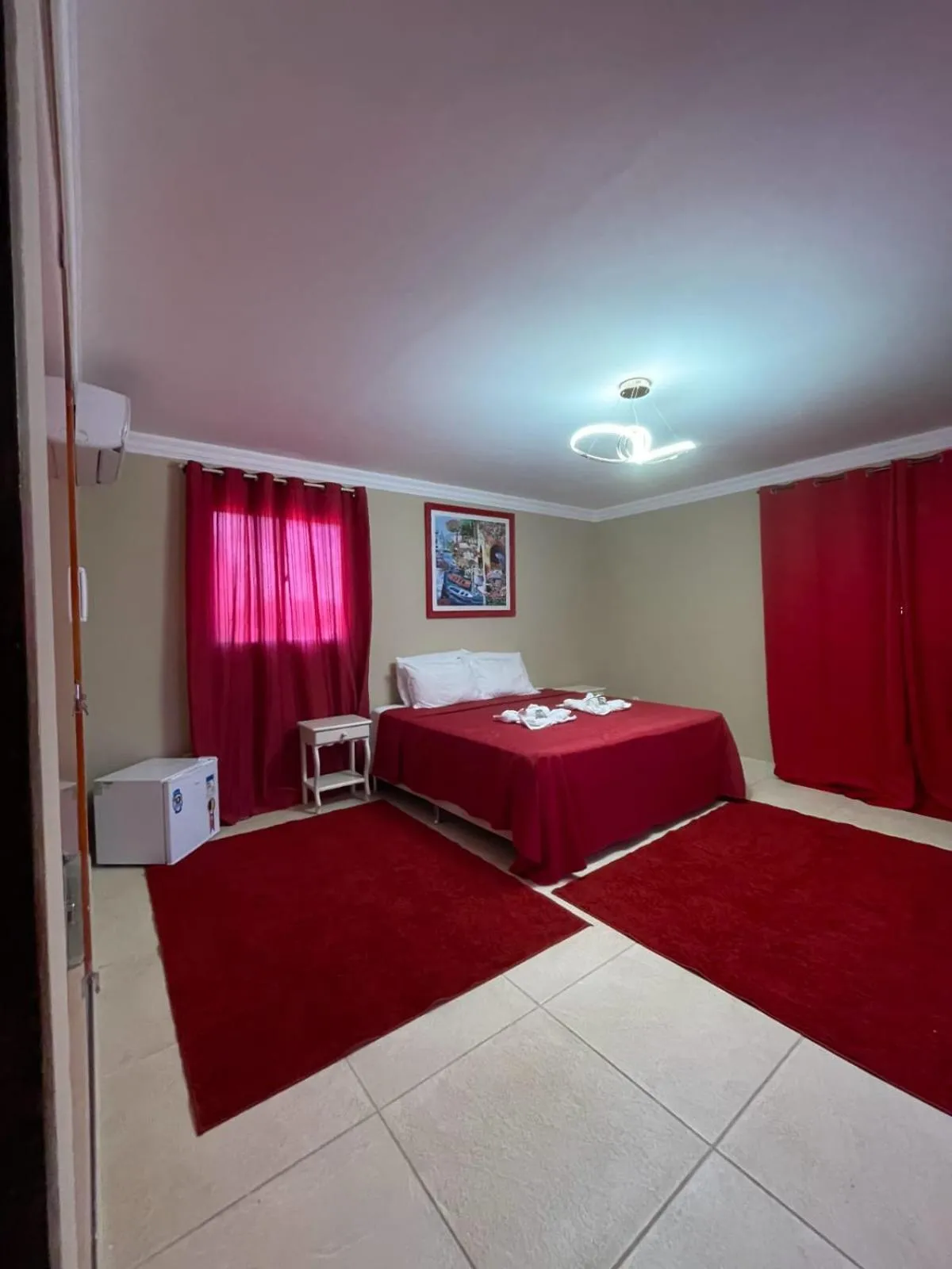 Bed in Relais de Charme Boutique Hotel Pititinga