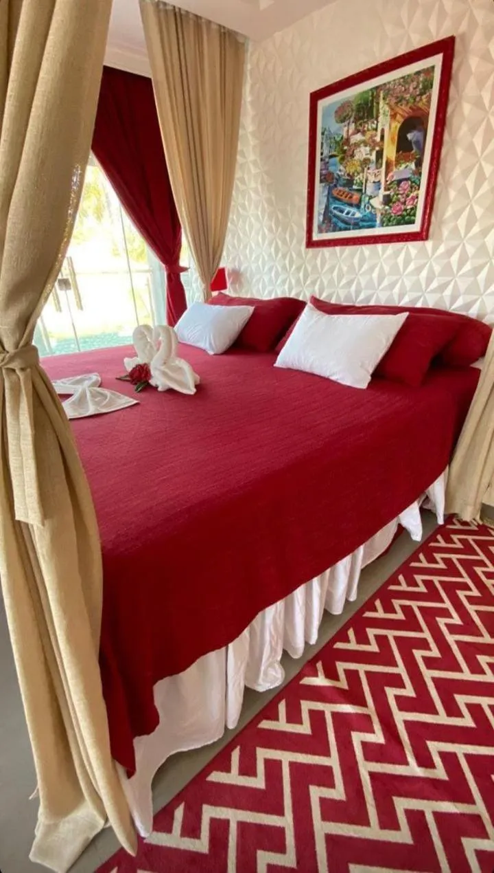 Photo of the whole room, Bed in Relais de Charme Boutique Hotel Pititinga