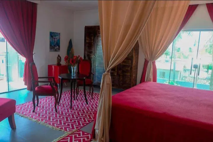 Photo of the whole room, Bed in Relais de Charme Boutique Hotel Pititinga