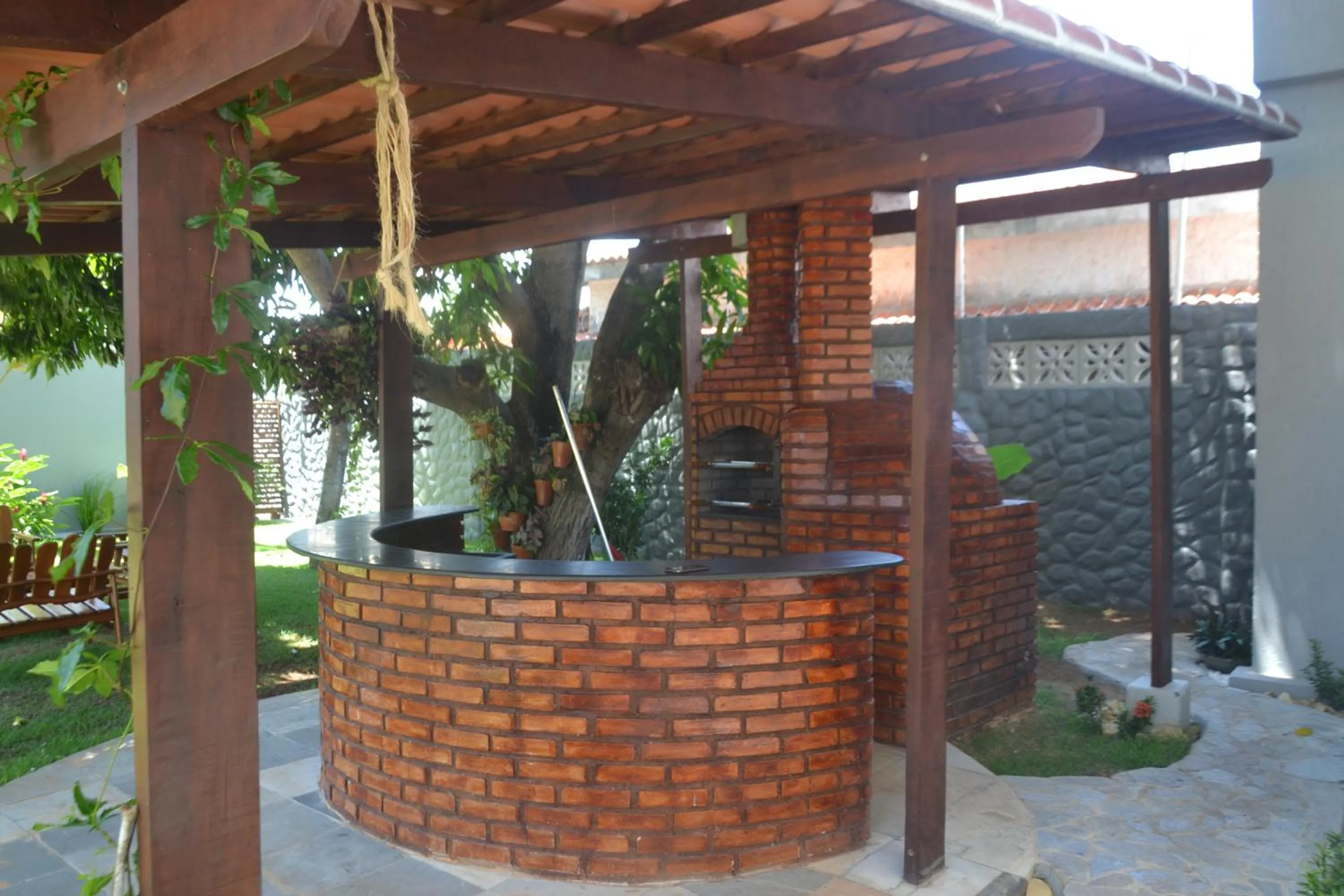 BBQ facilities in Relais de Charme Boutique Hotel Pititinga