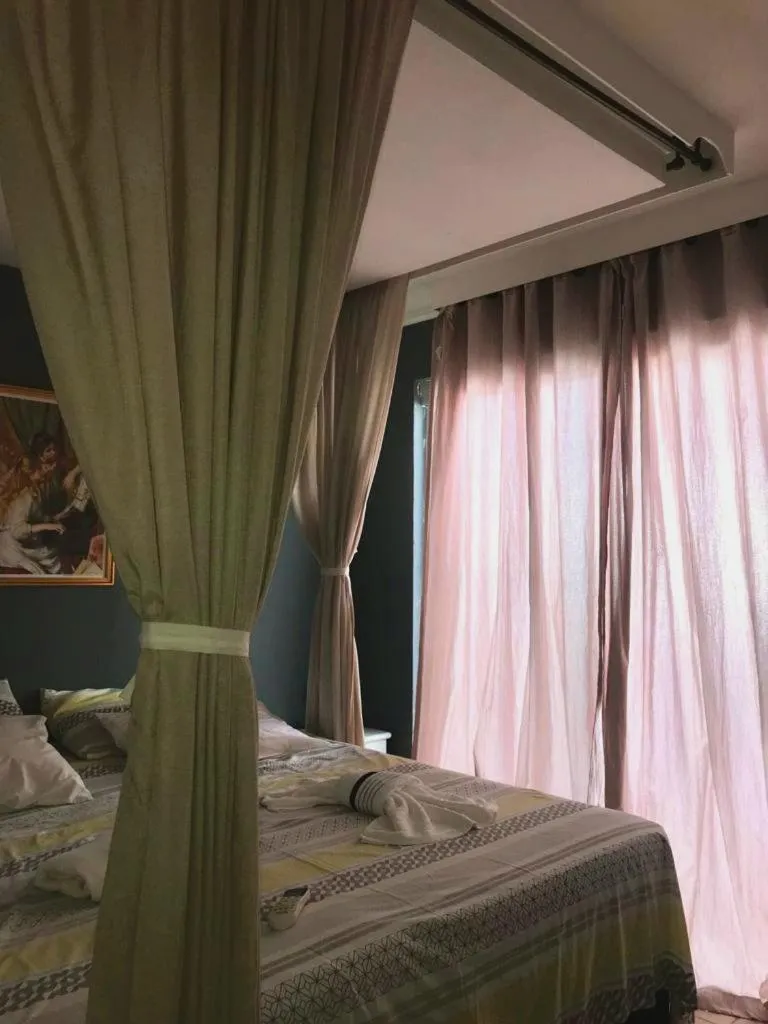 Bed in Relais de Charme Boutique Hotel Pititinga