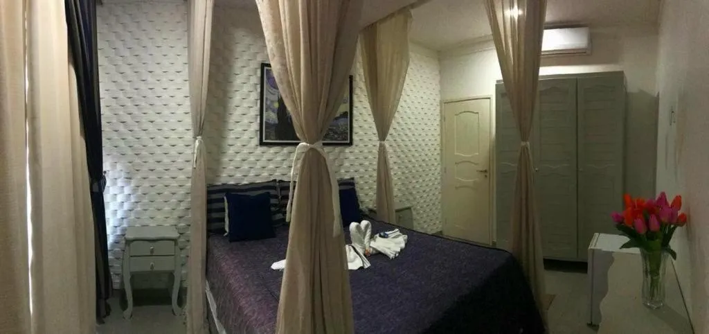 Photo of the whole room, Bed in Relais de Charme Boutique Hotel Pititinga