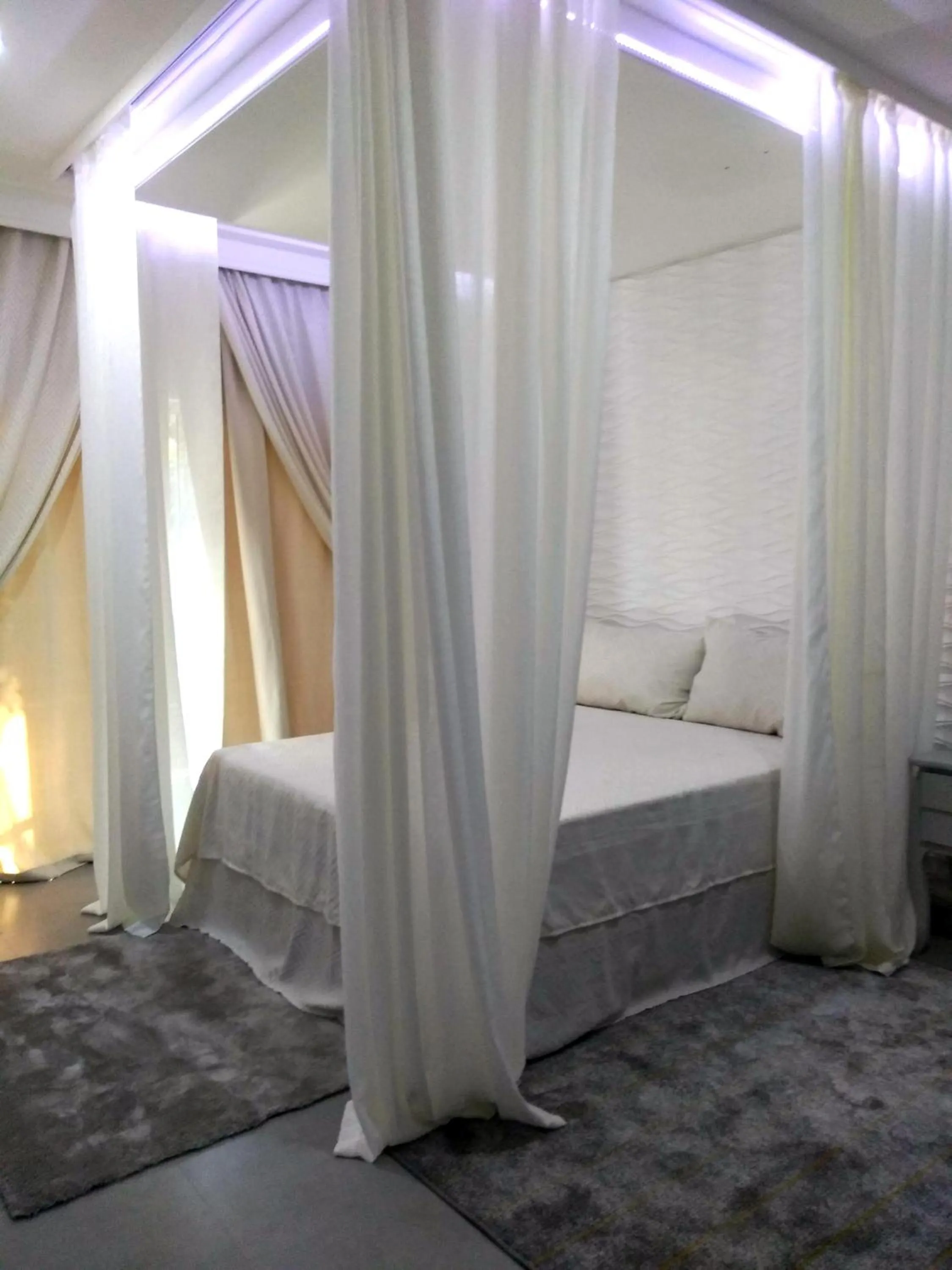 Bed in Relais de Charme Boutique Hotel Pititinga