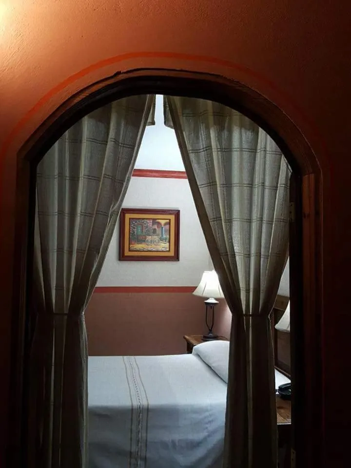 Bed in Hotel Posada San Jerónimo