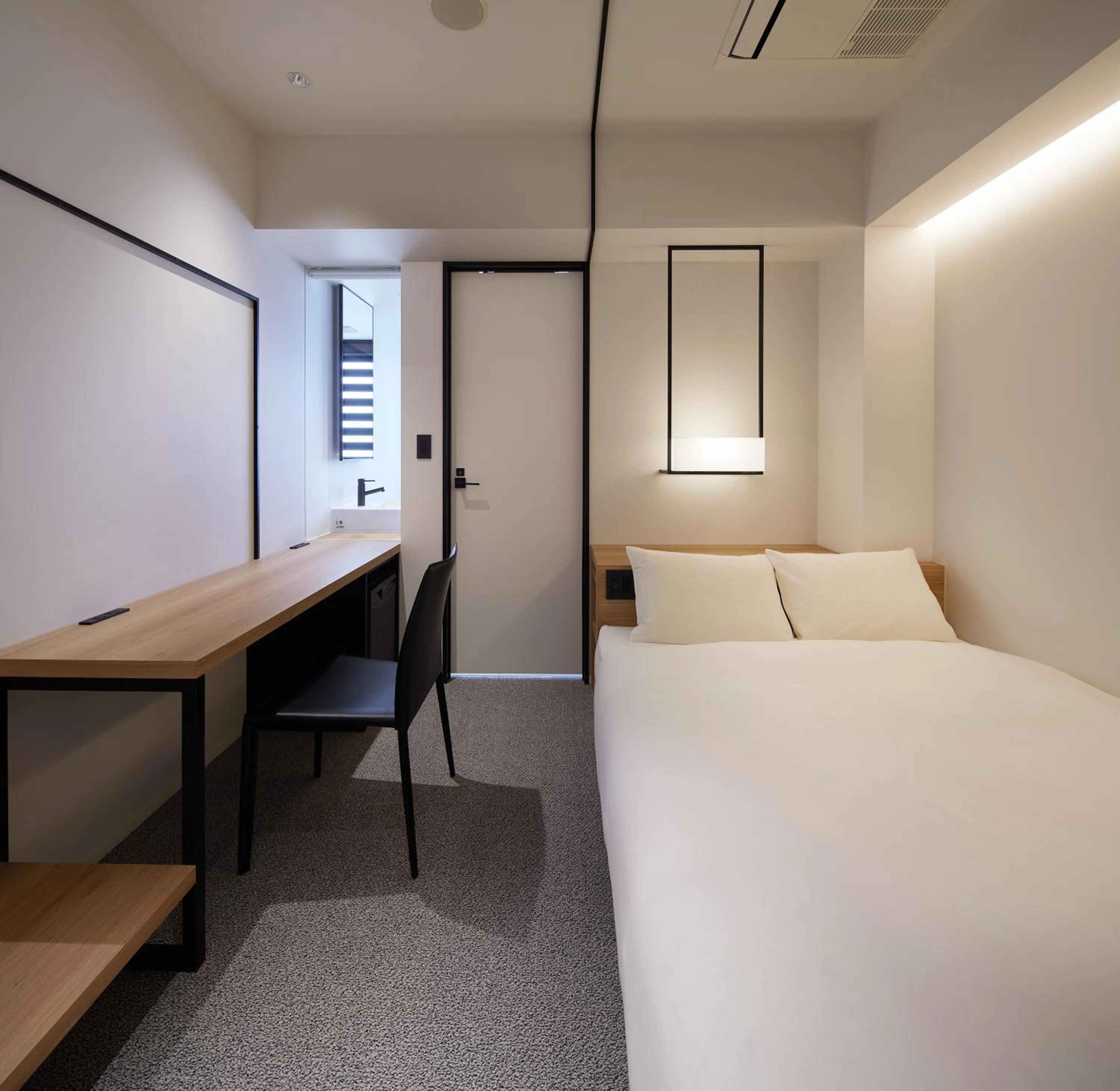 Bed in hotel androoms Nagoya Fushimi