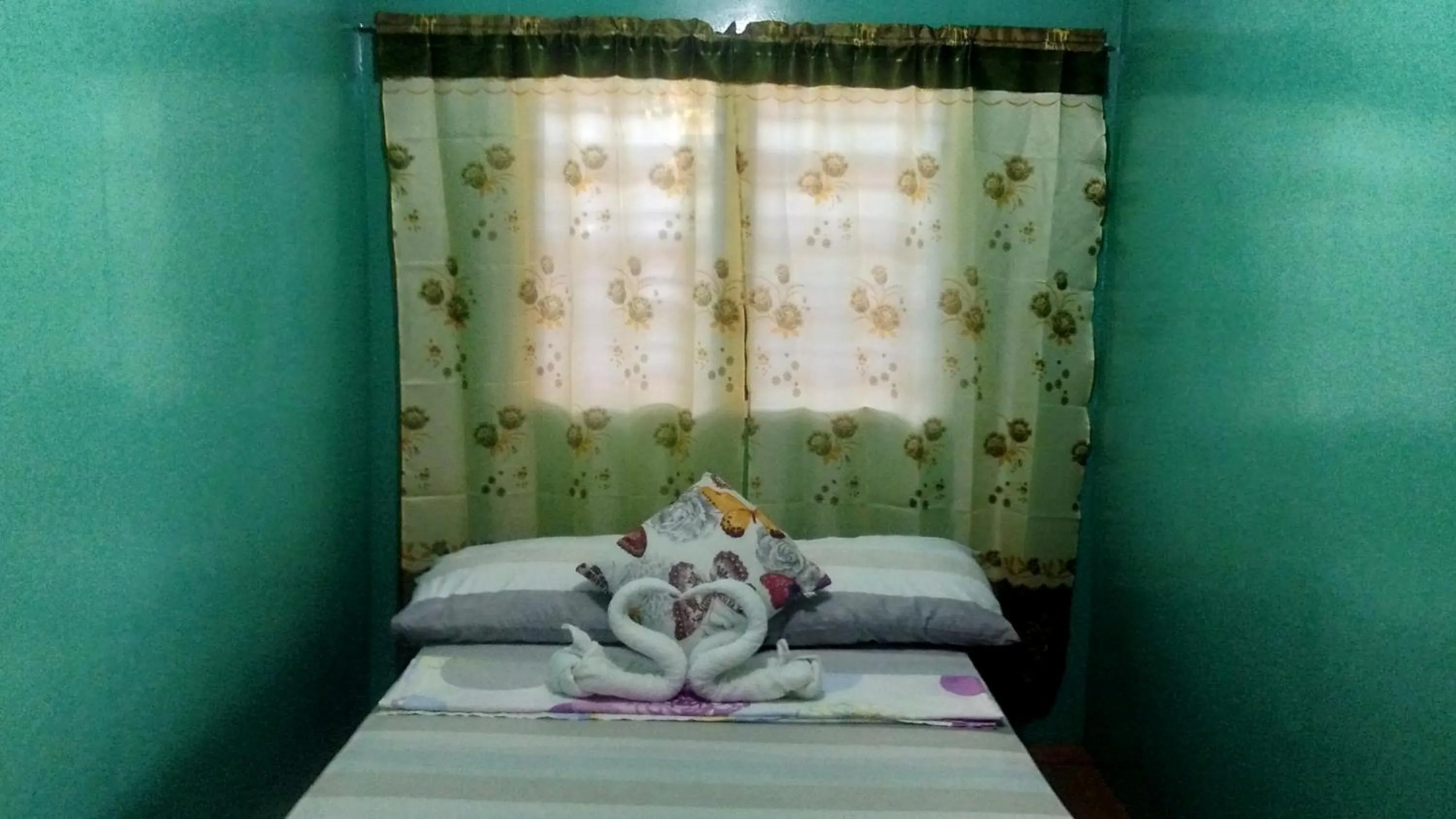 Bed in Acuario Beach Inn