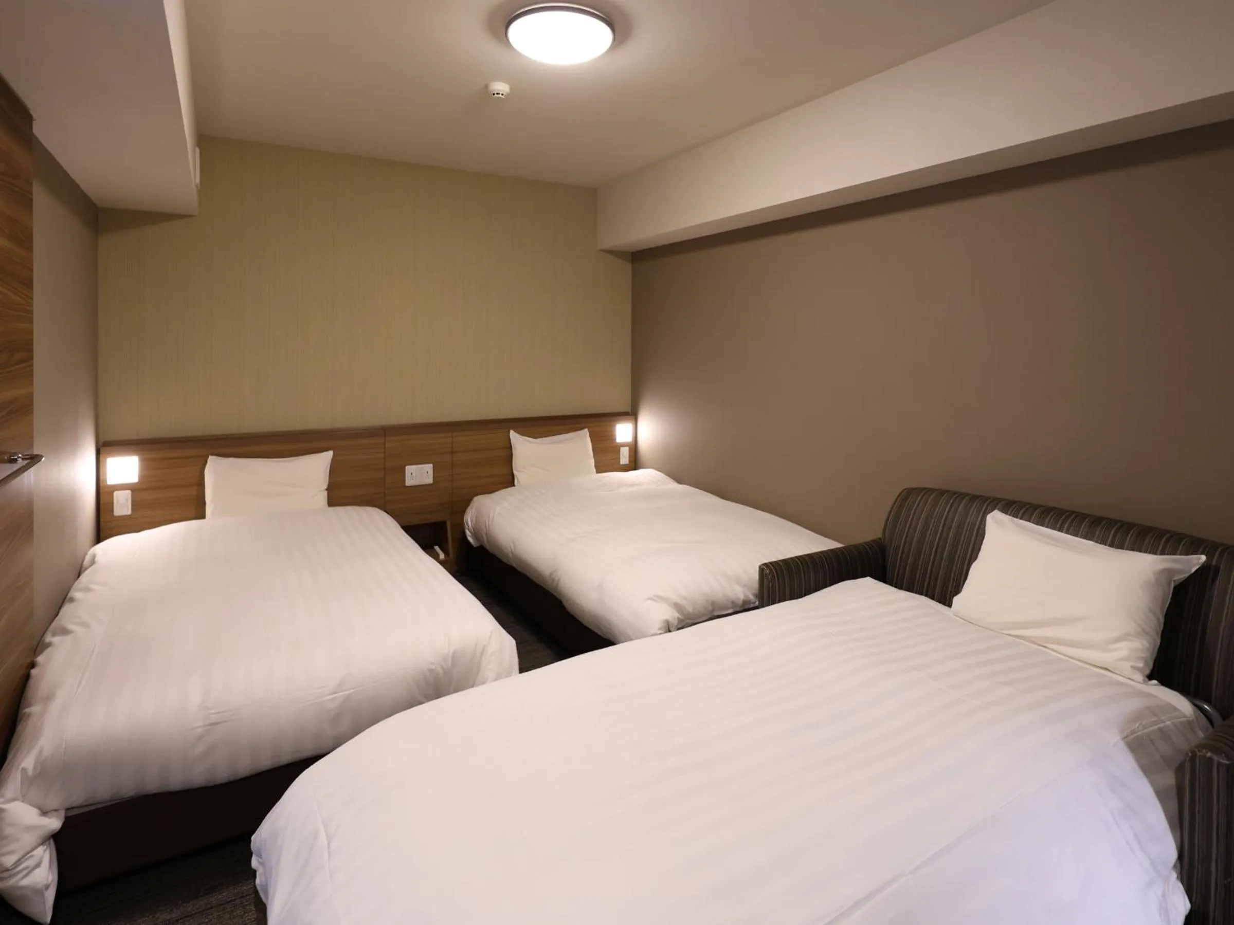 Bed in Dormy Inn Premium Fukui Natural Hot Spring