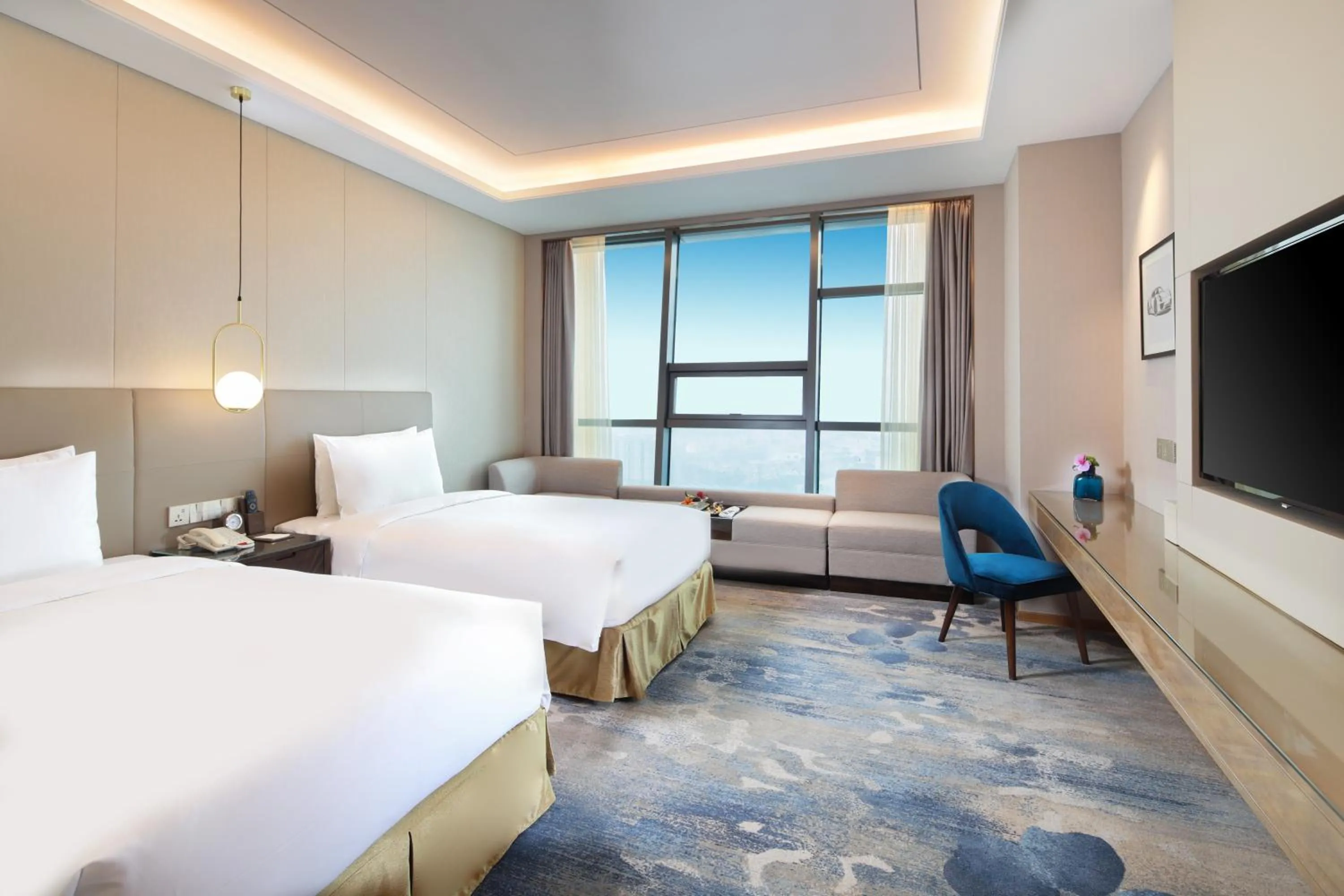 Bed in Auto City Ruili Hotel