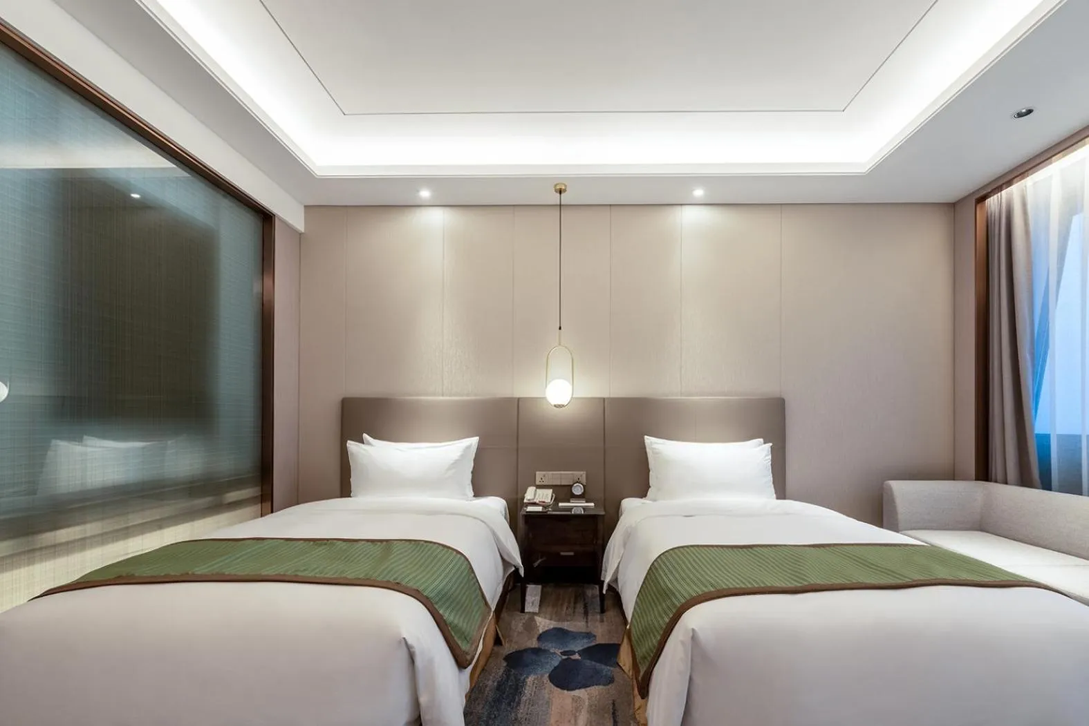 Bed in Auto City Ruili Hotel