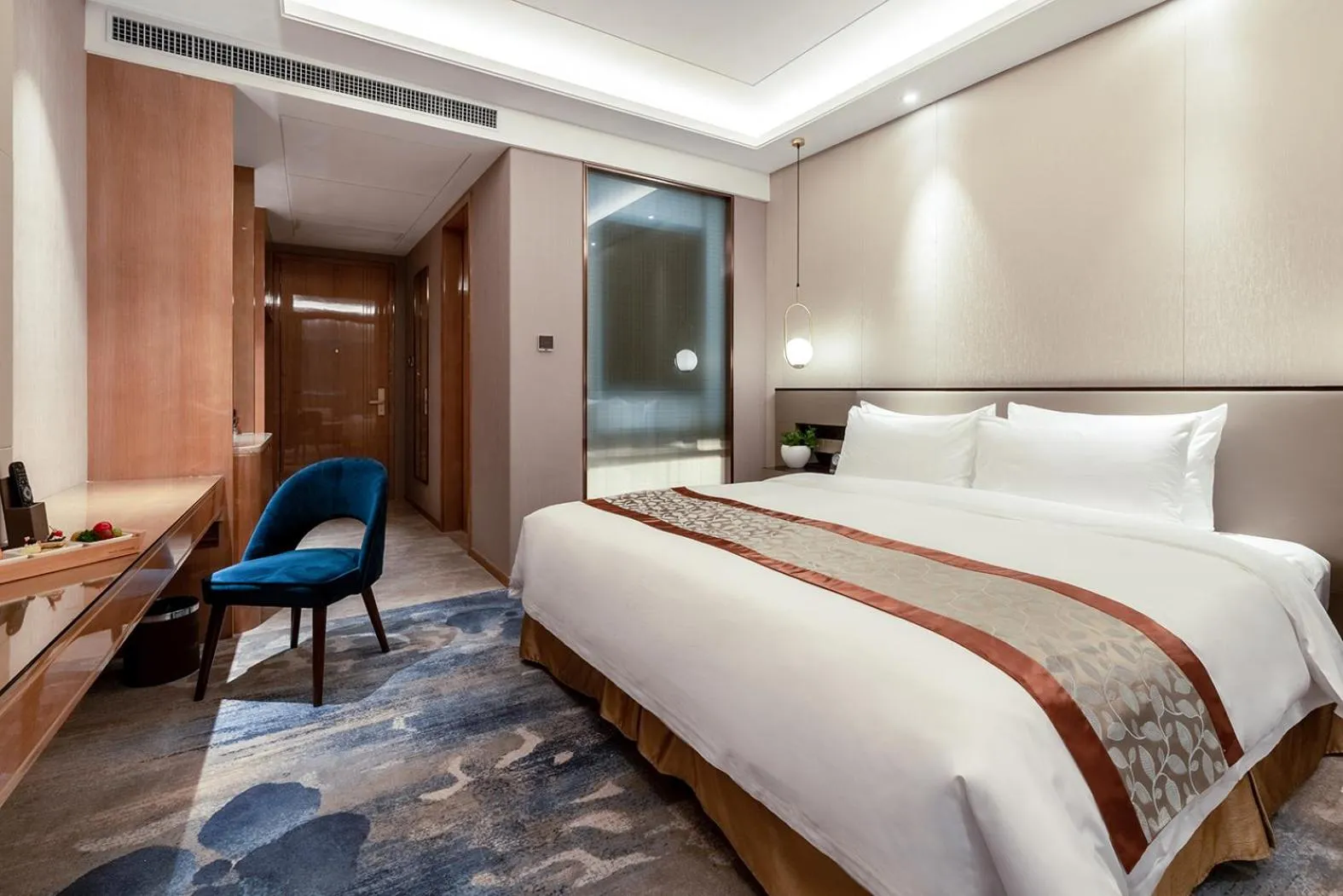 Bed in Auto City Ruili Hotel