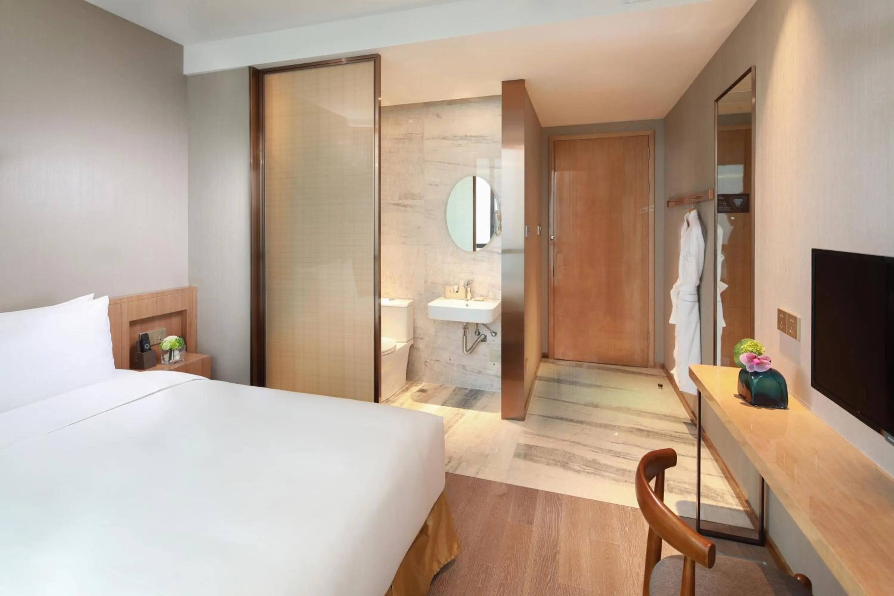 Bed in Auto City Ruili Hotel