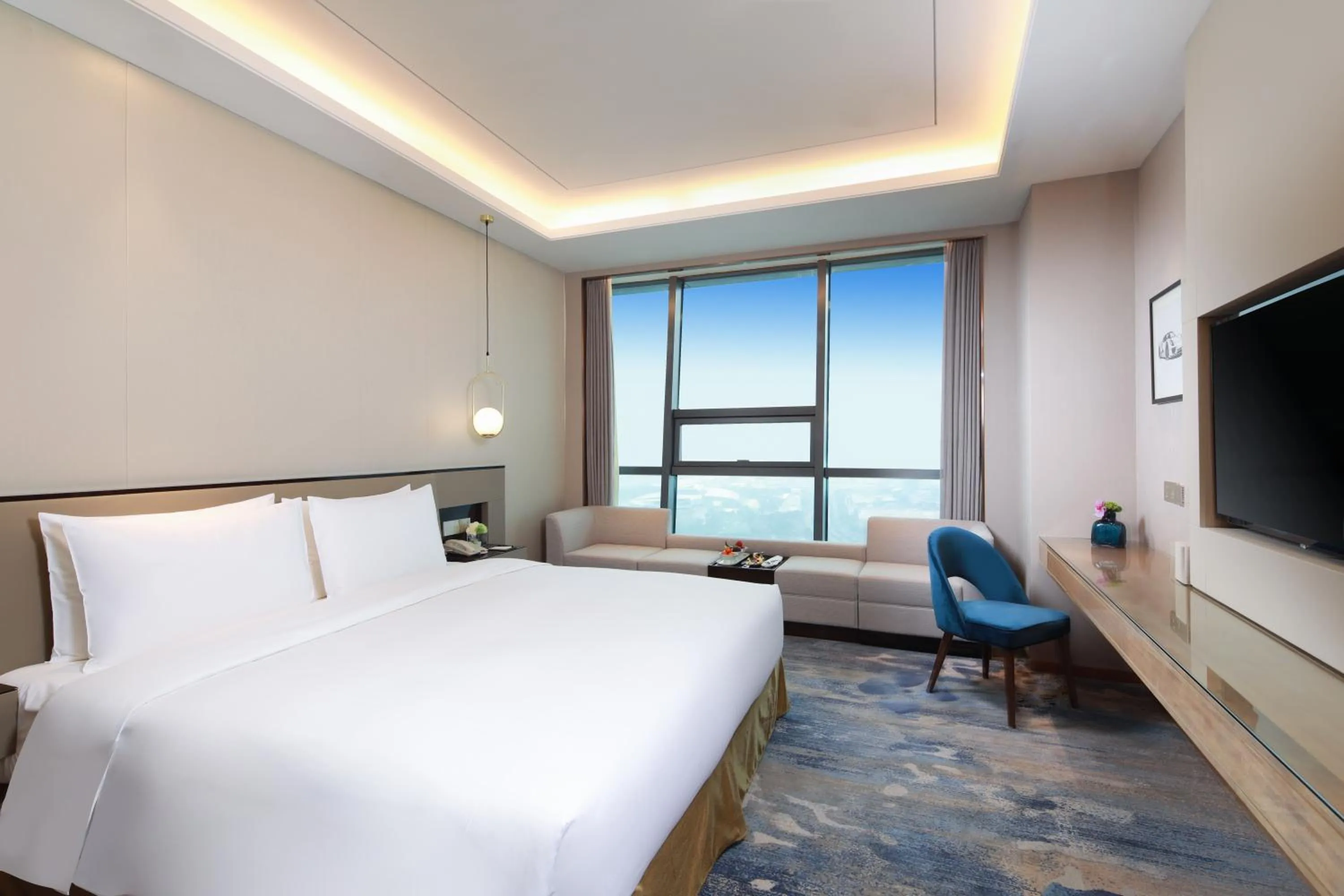 Bed in Auto City Ruili Hotel