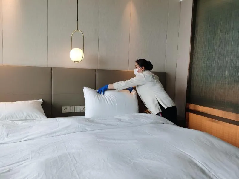 Bed in Auto City Ruili Hotel