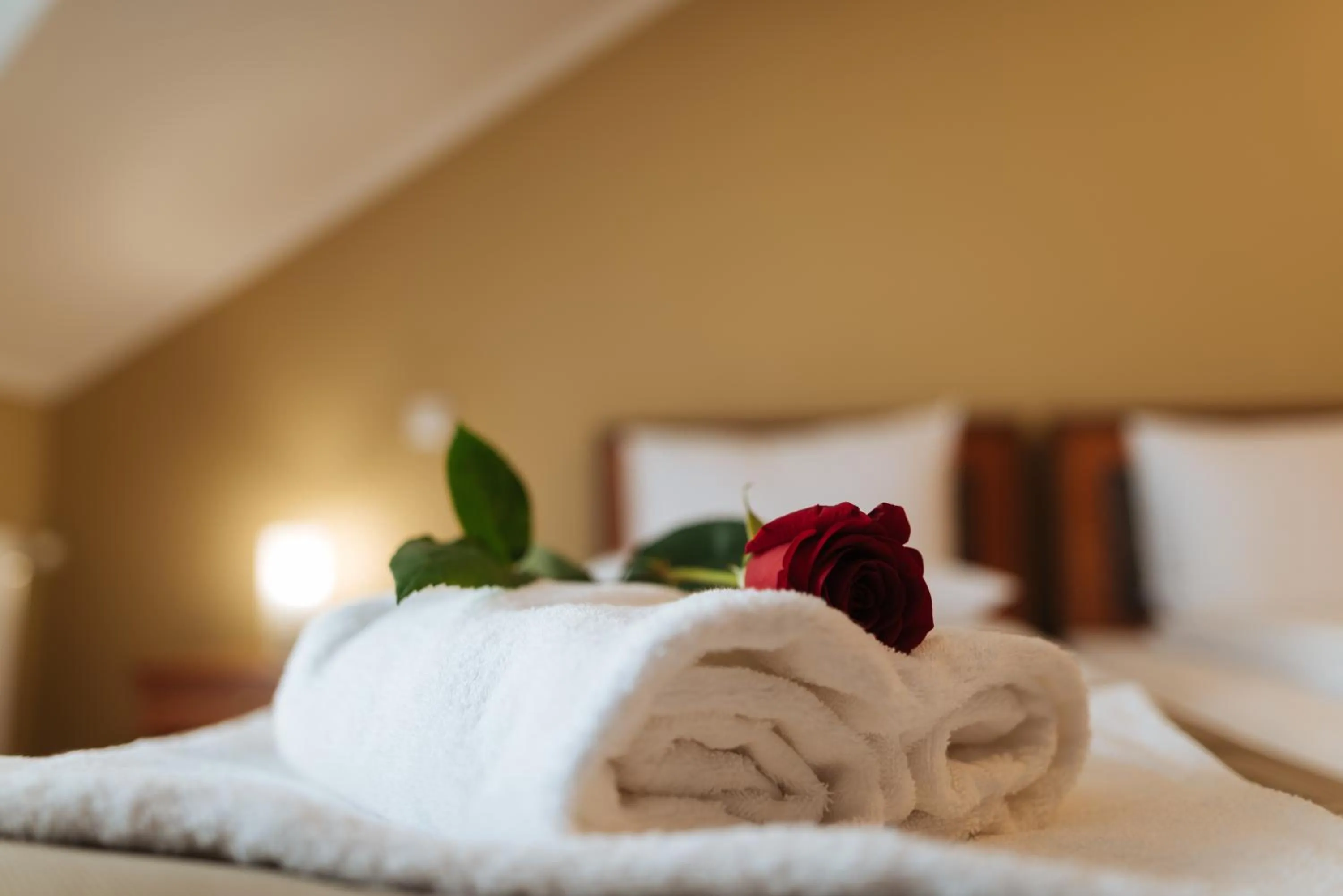 Bed in Areo Hotel & Restaurant