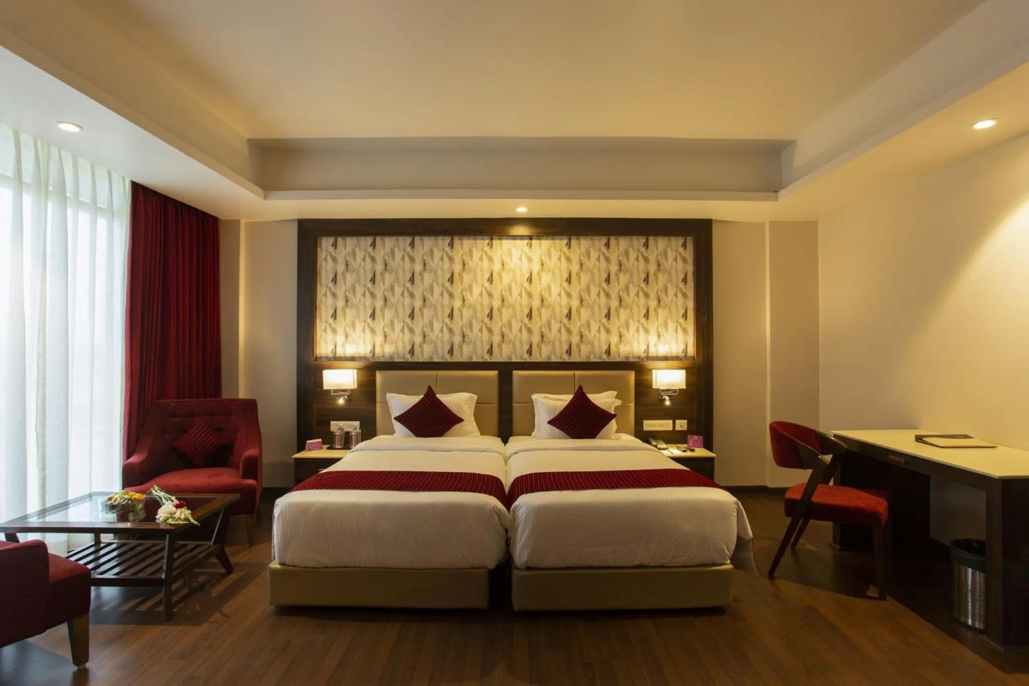 Photo of the whole room, Bed in Sarovar Portico, Somnath