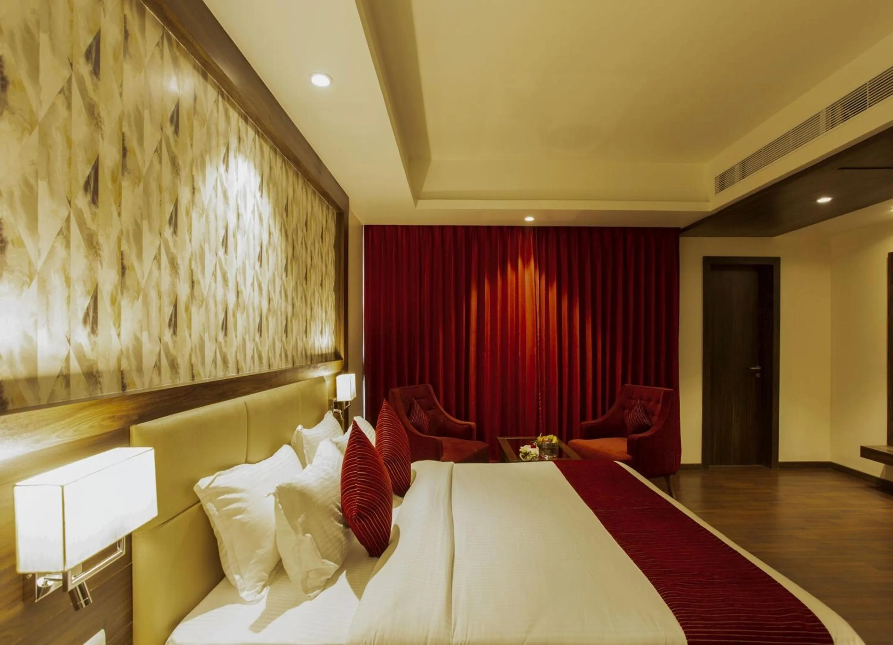 Bedroom, Bed in Sarovar Portico, Somnath