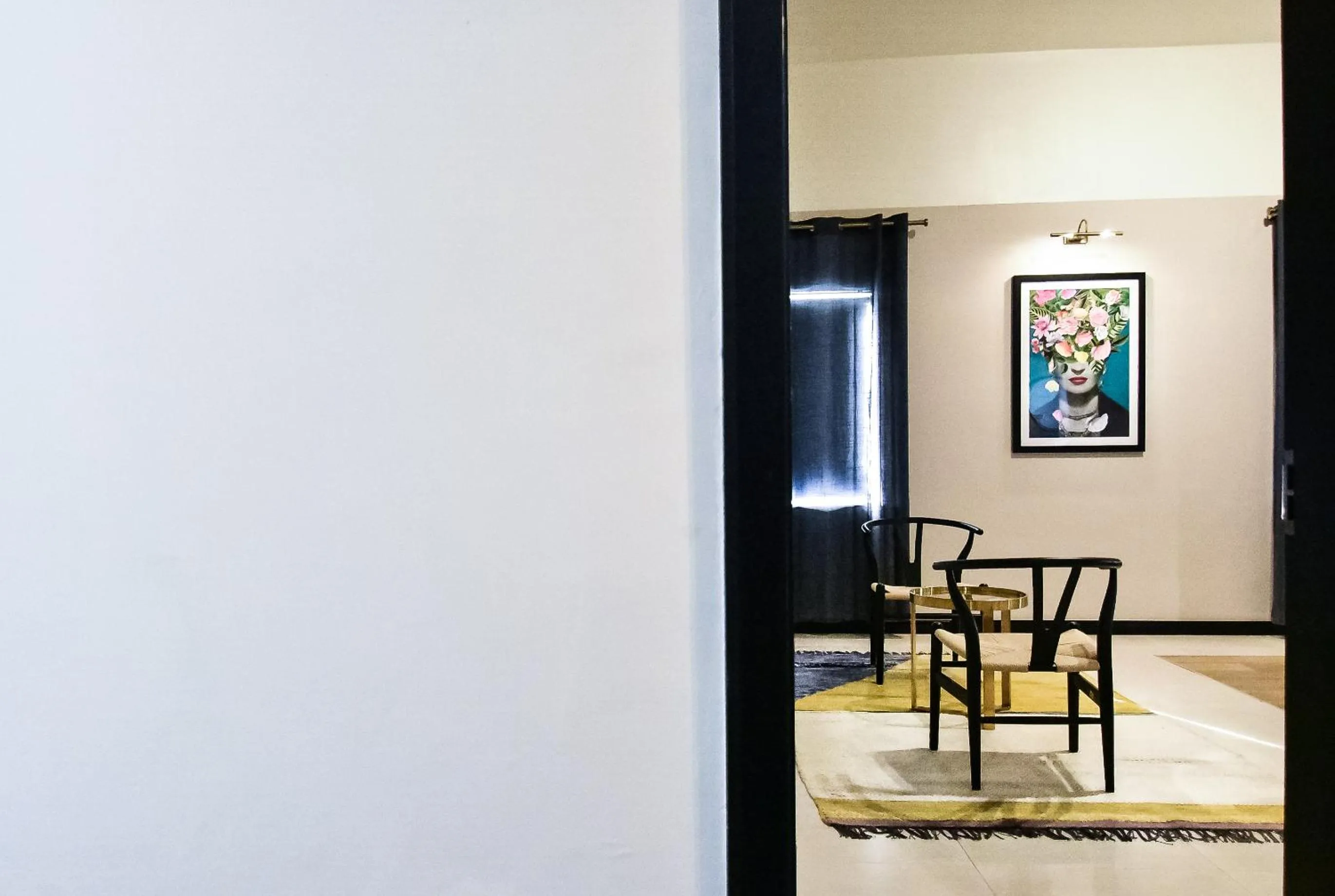 Seating area in Atelier Boutique Hotel